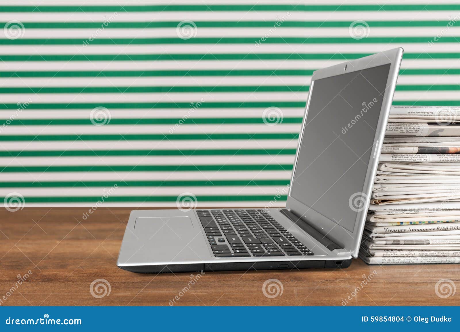 Laptop and Newspapers stock photo. Image of computer 59854804
