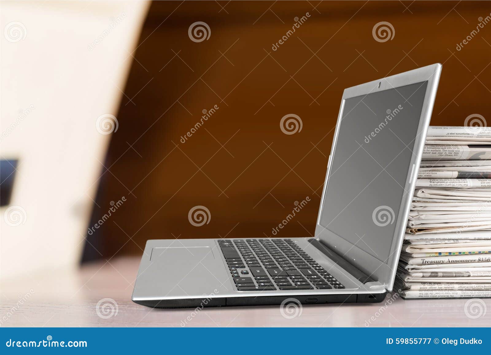 Laptop and Newspapers stock image. Image of data, medium 59855777