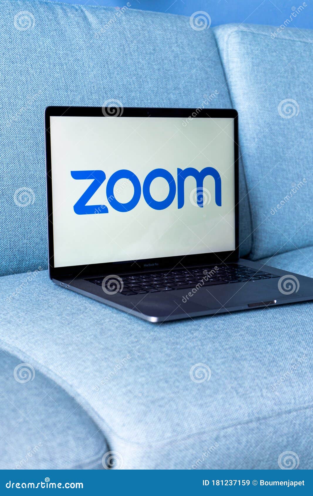 Laptop Showing Zoom Cloud Meetings App Logo