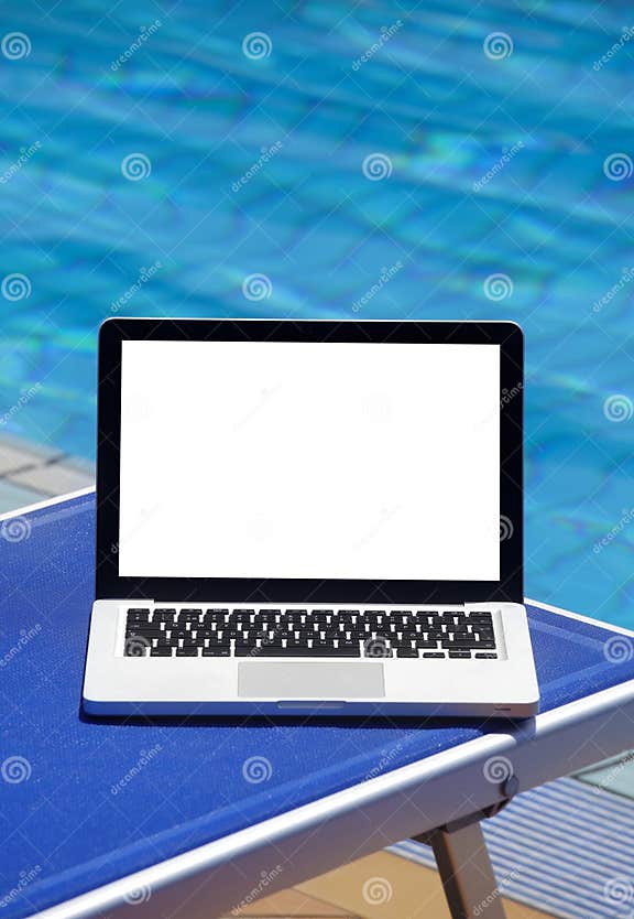 Laptop by swimming pool stock photo. Image of pool, luxury 20734426