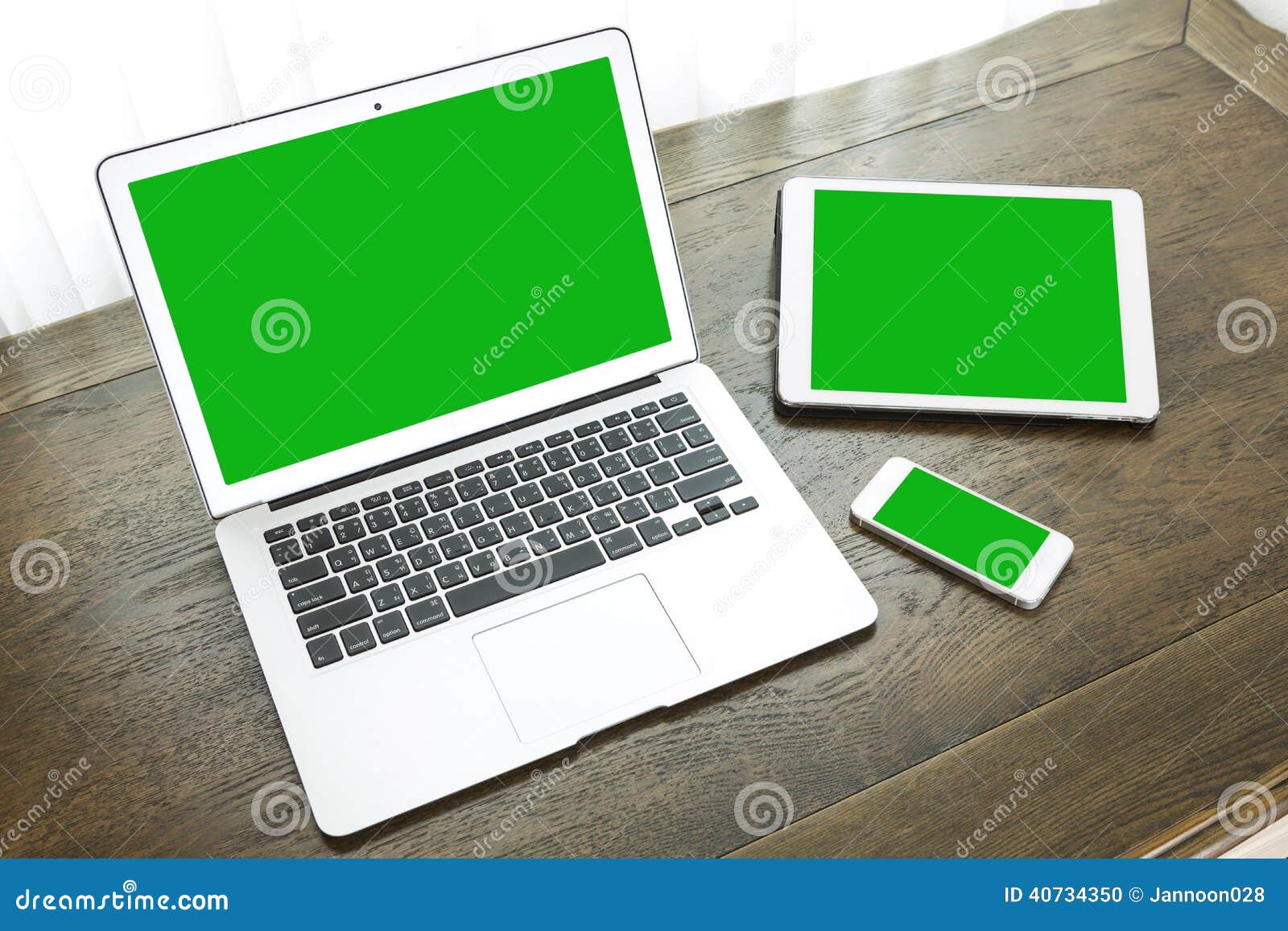Laptop with Tablet and Smart Phone on Table Editorial Image Image of