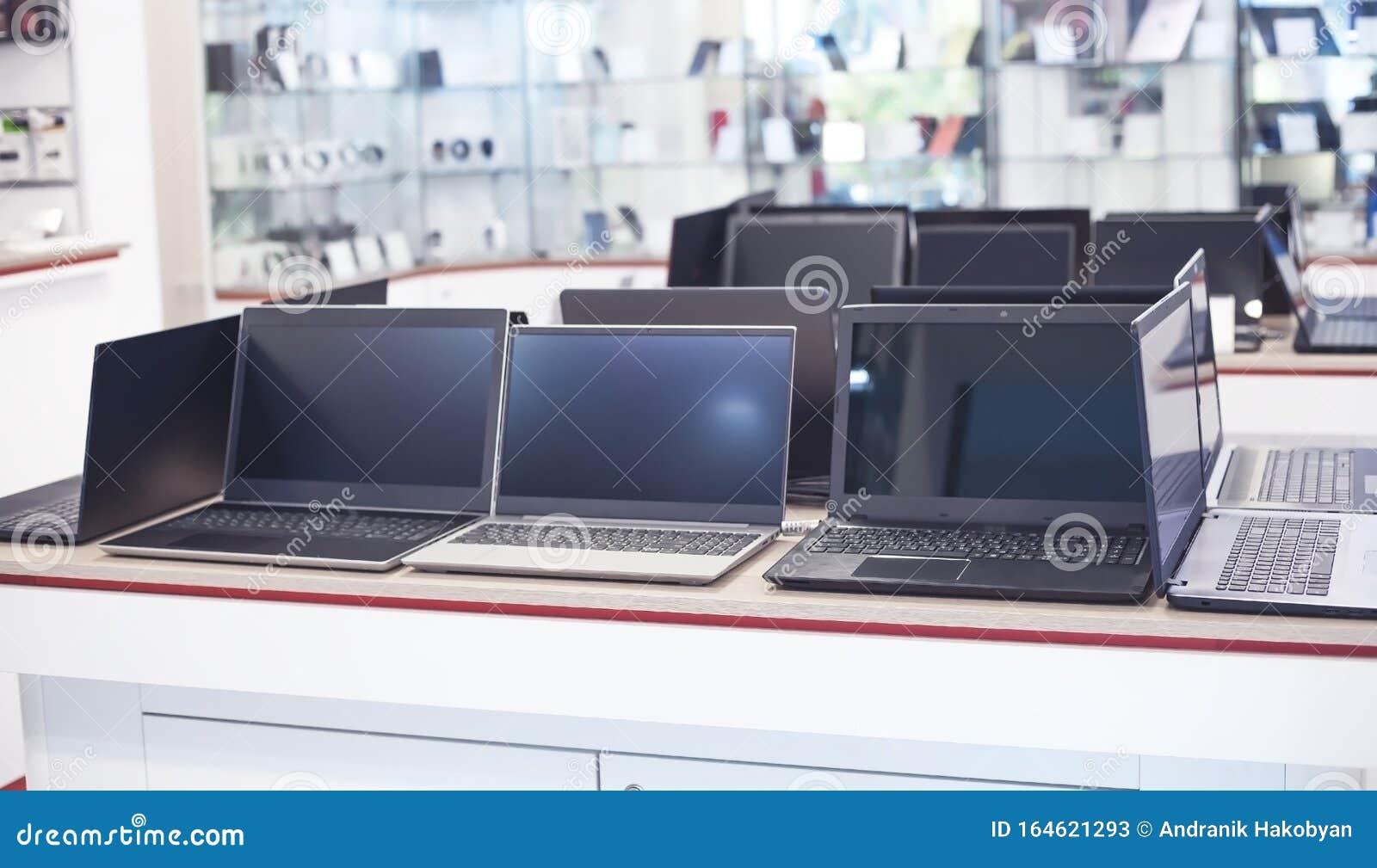 laptops on the table in the electronics store