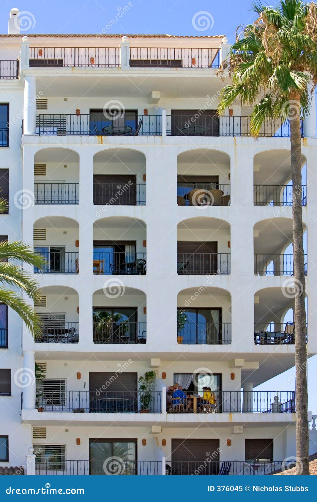 Large Apartment Block In Spanish Port On The Costa Del Sol Stock Image