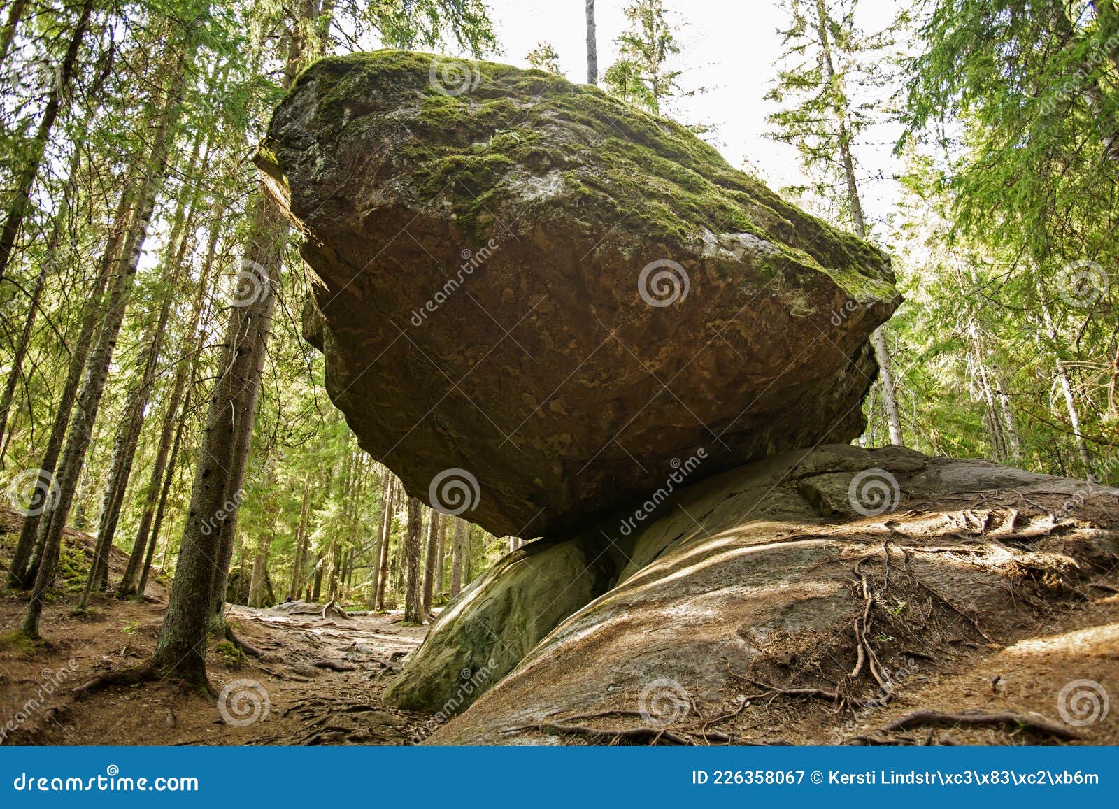 a large balancing boulder rock called kummakivi