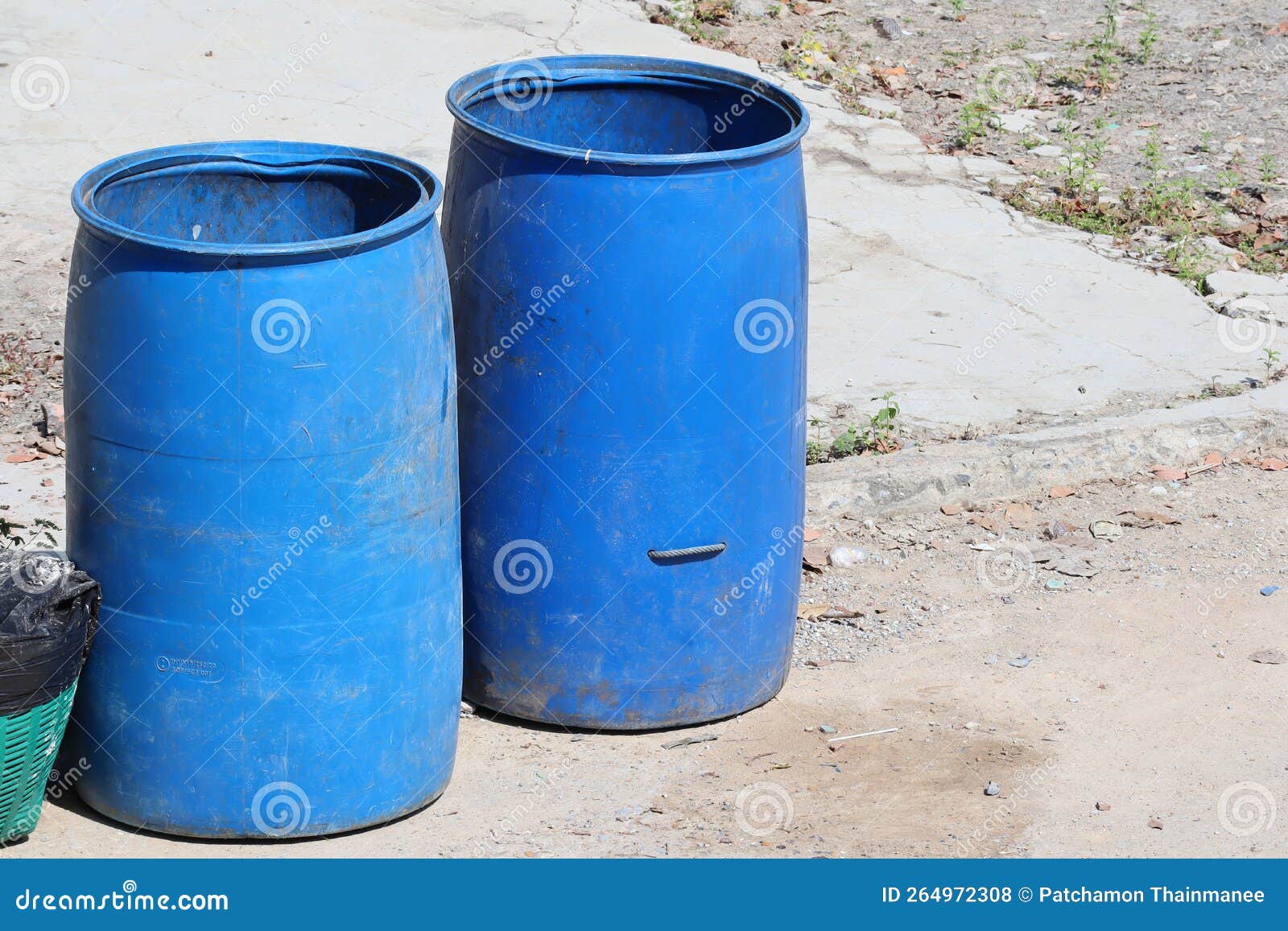 A Large Blue Plastic Waste Bin is Placed in Public Spaces in the