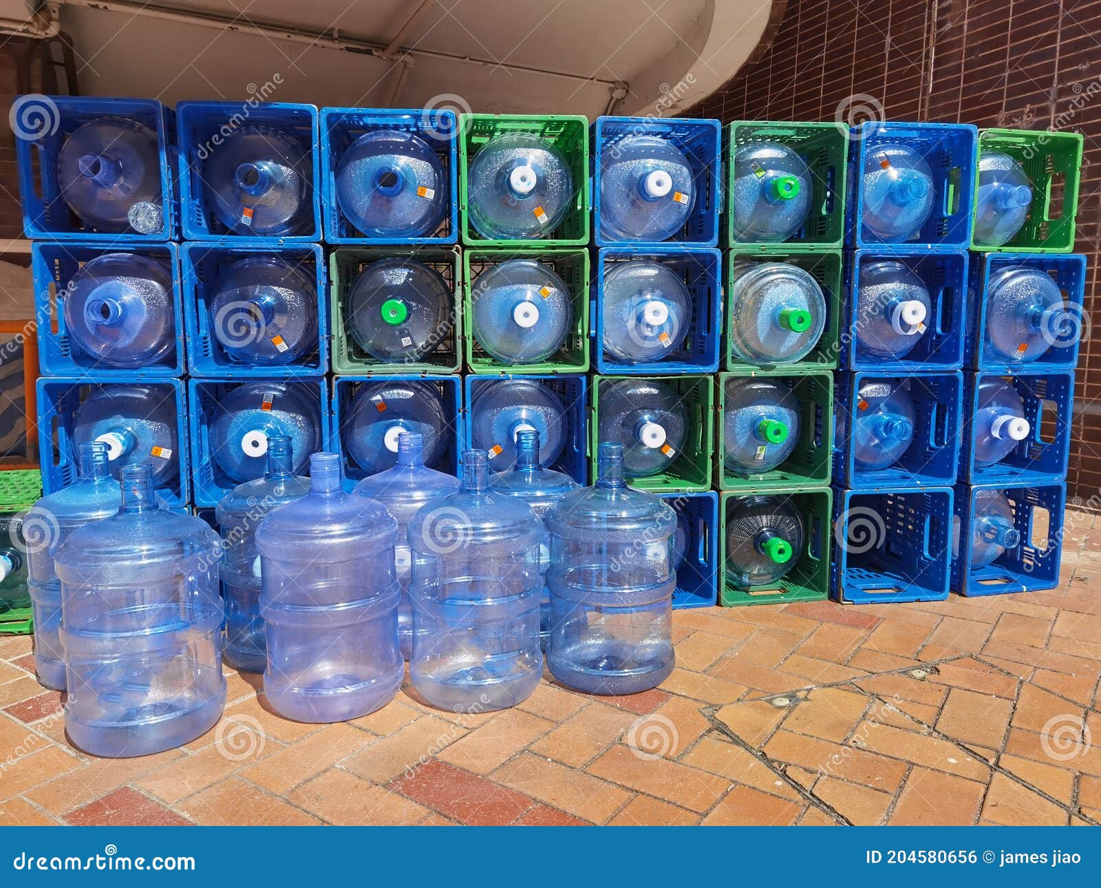 Large Blue Plastic Water Bottles in Container Stock Photo Image of