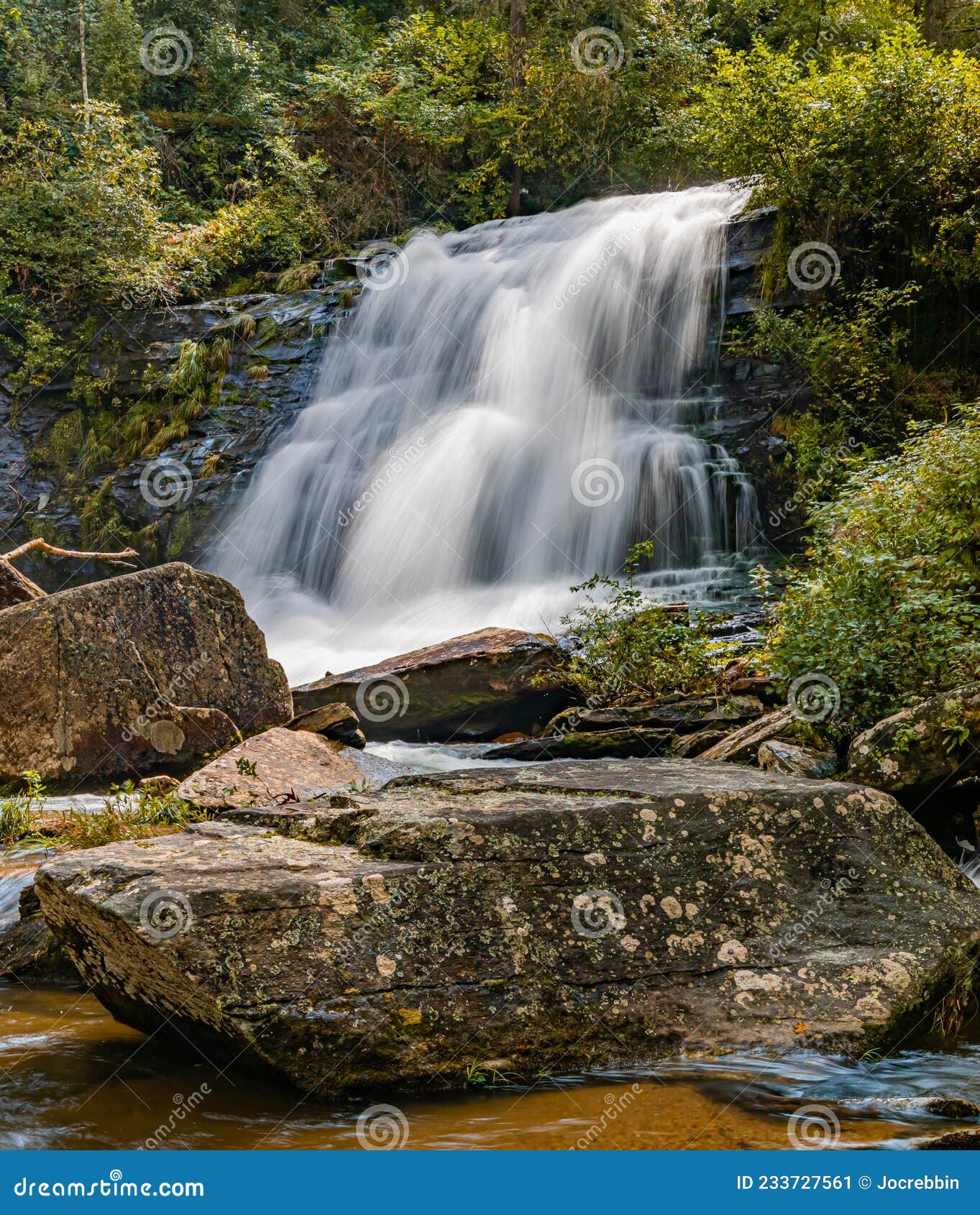 Large Bolder Frames the Bottom of the Glen Cannon Waterfall Stock Image