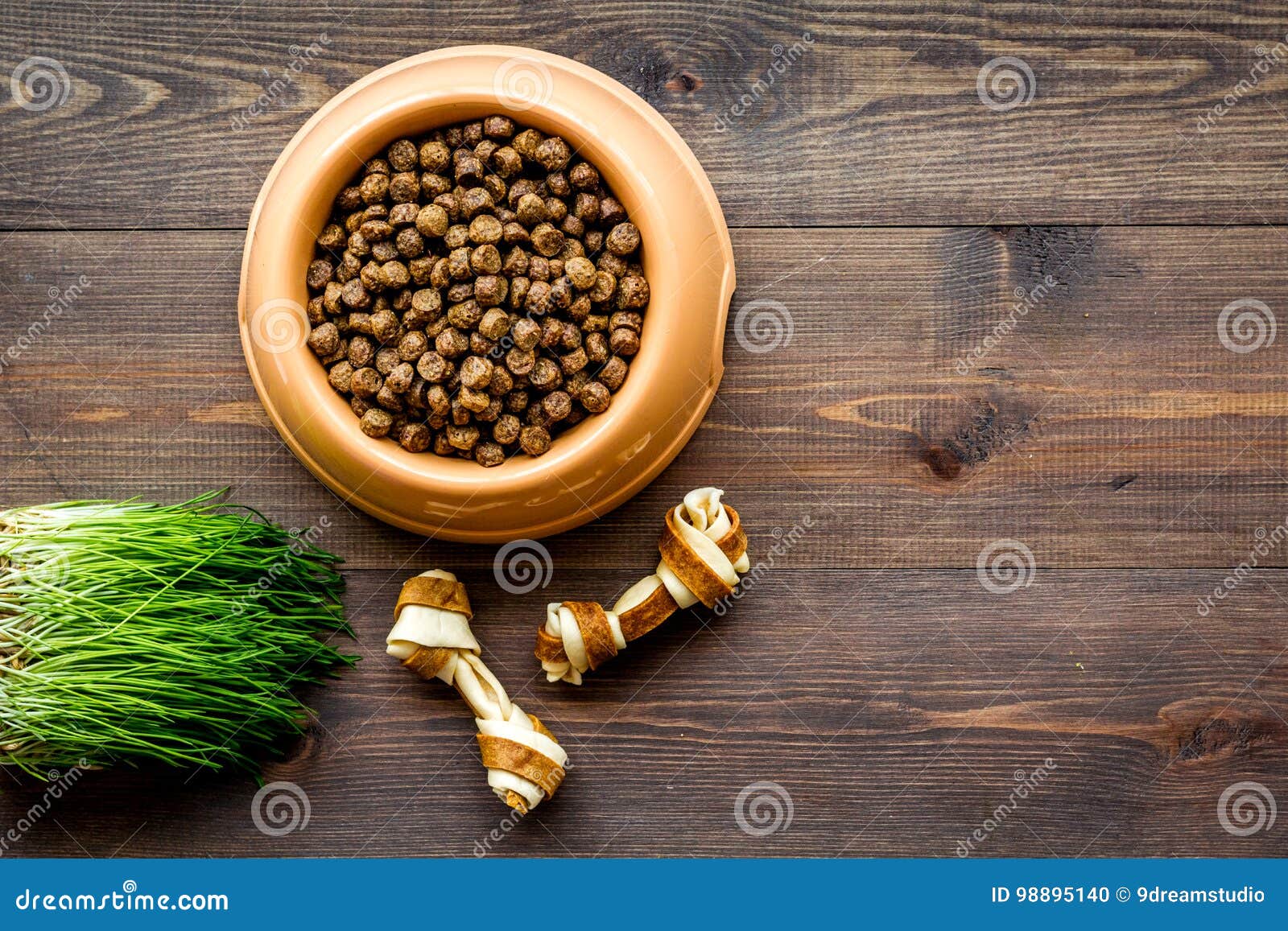 Download Large Bowl Of Pet - Dog Food With Toys On Wooden Background Top View Mockup Stock Photo - Image ...