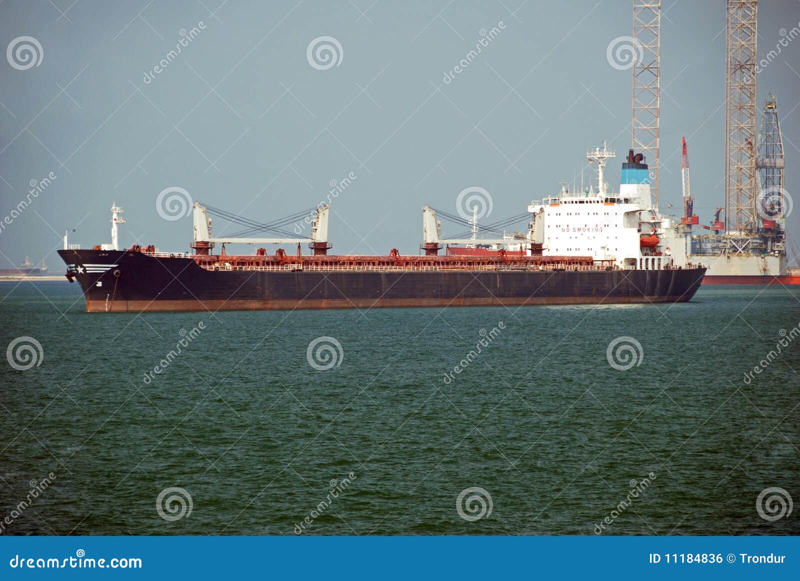 Large Bulk Carrier in Singapore Anchorage. Stock Photo Image of
