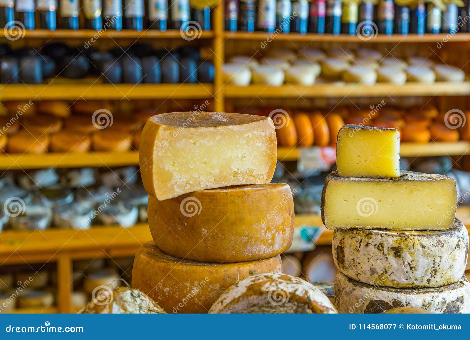 cheese heads on the counter in a gastronomic store