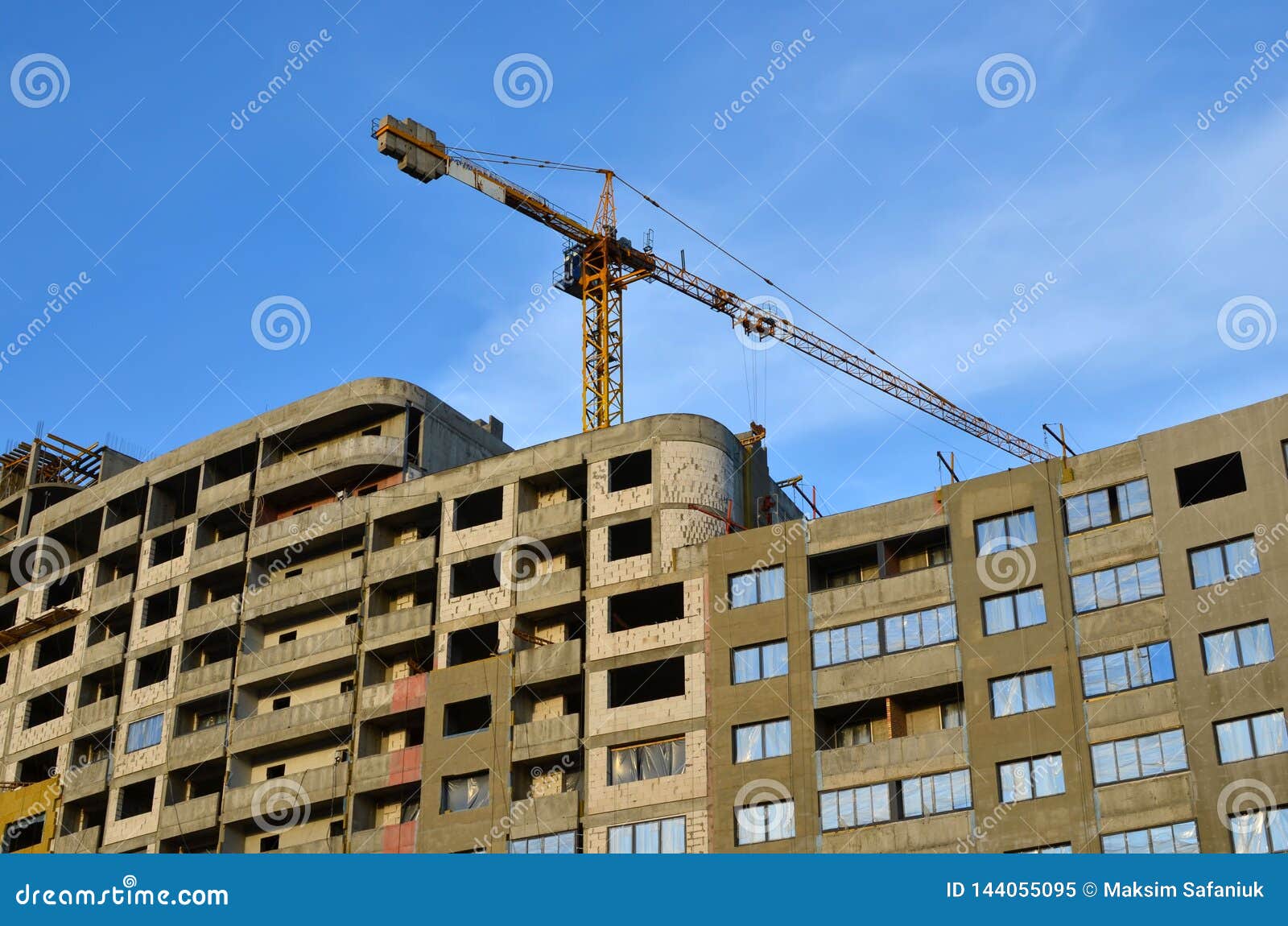 Large Construction  Site  With Cranes On The Blue Sky 