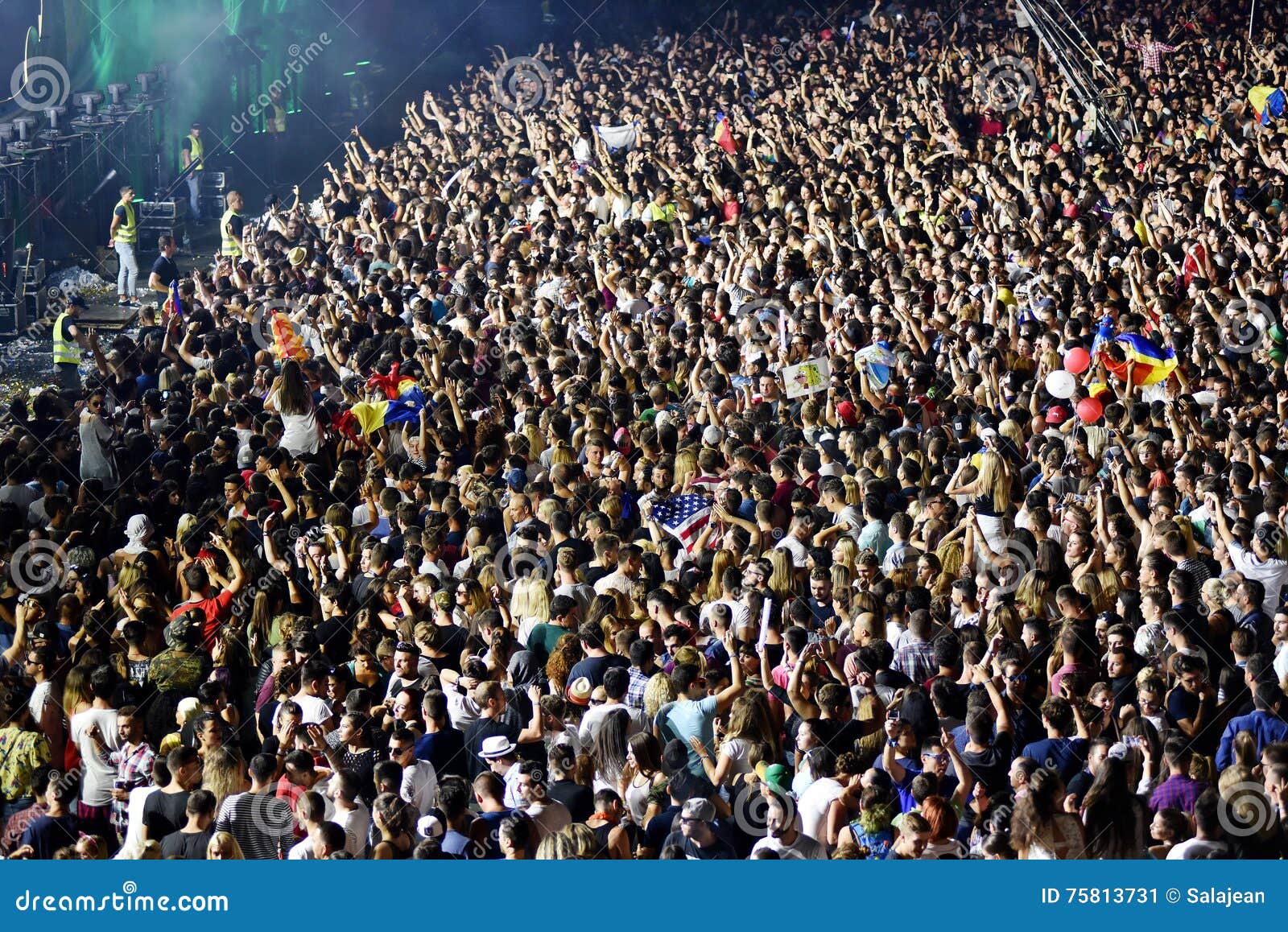 Large Crowd of People at a Concert in the Front of the Stage Editorial ...