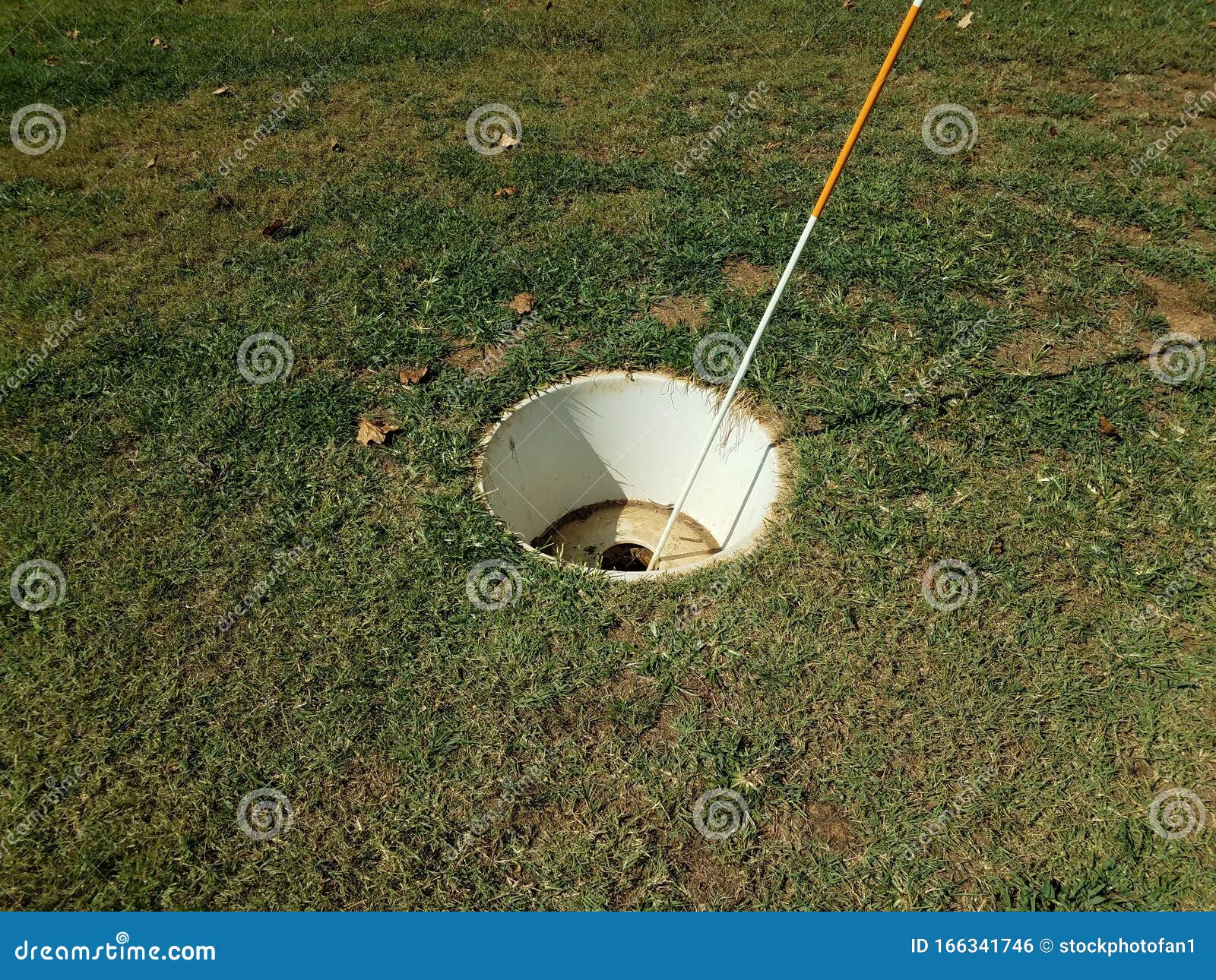 Large Cup or Hole with Flag Stick for Foot Golf Stock Photo Image of