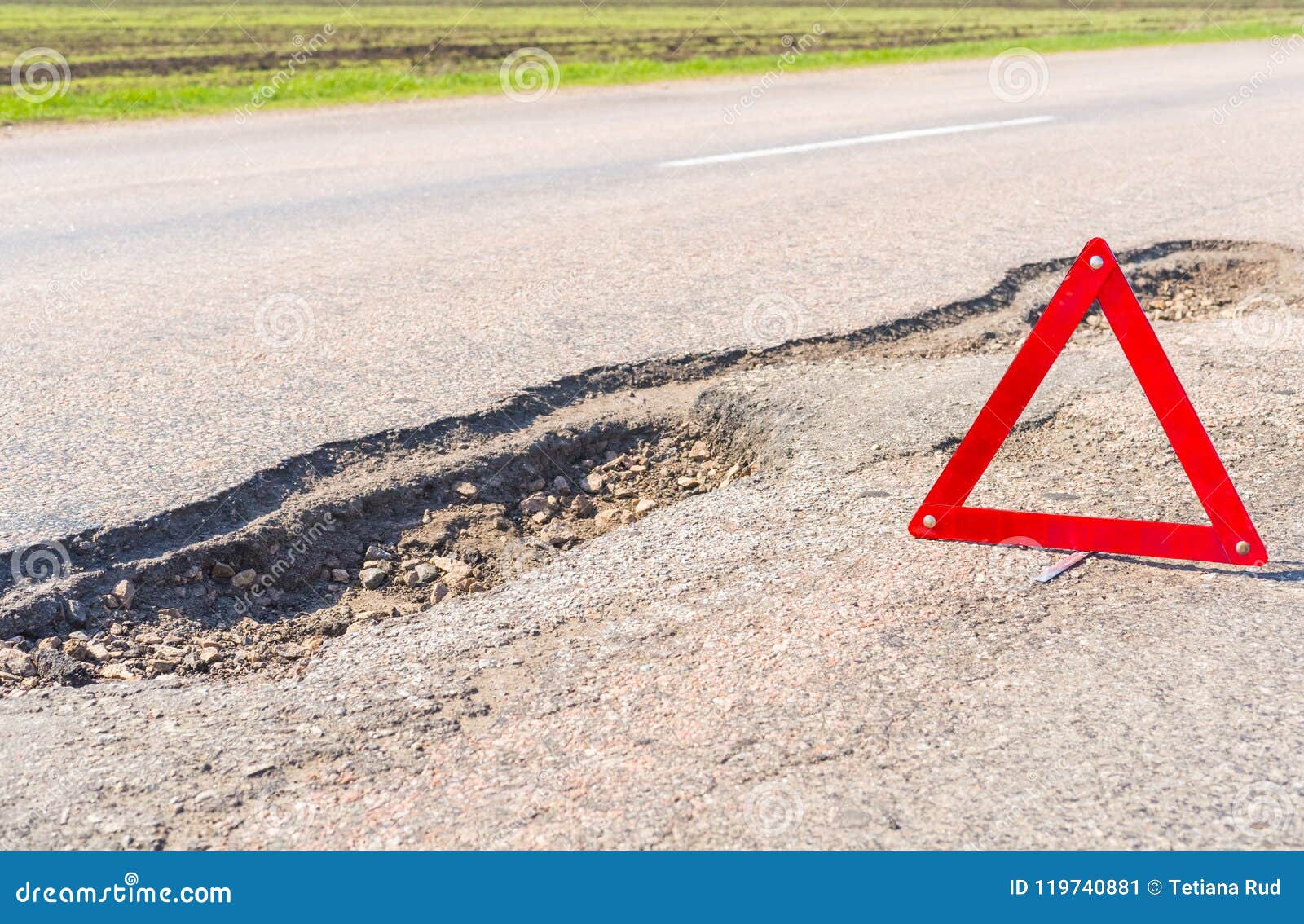 large deep pothole an example of poor road