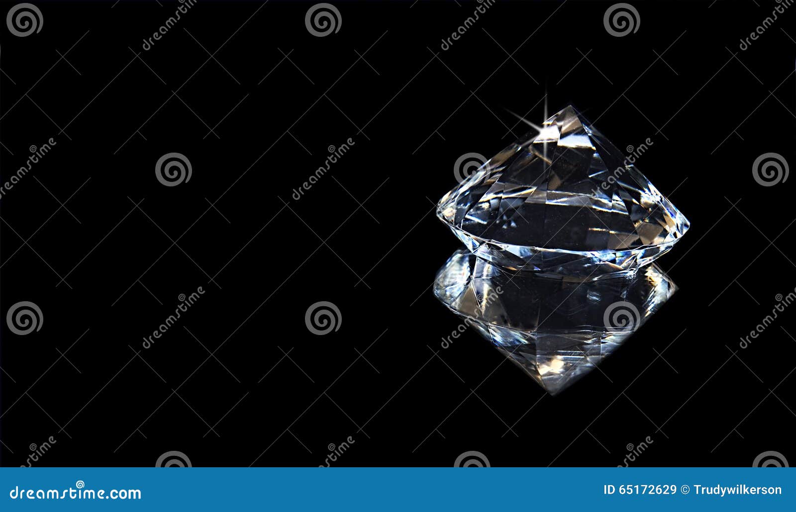 large faux diamond and its reflection - black background