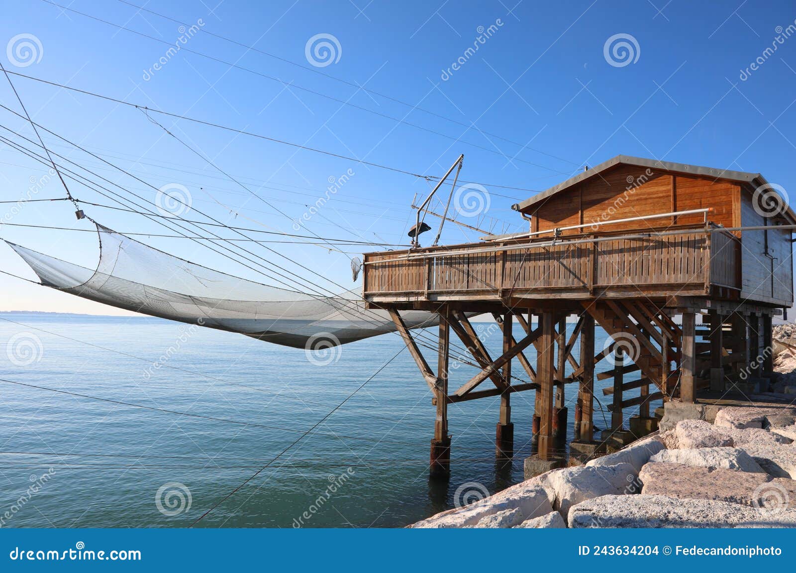 Large Fishing Hut and the Huge Nets for Catching Fish Stock Photo