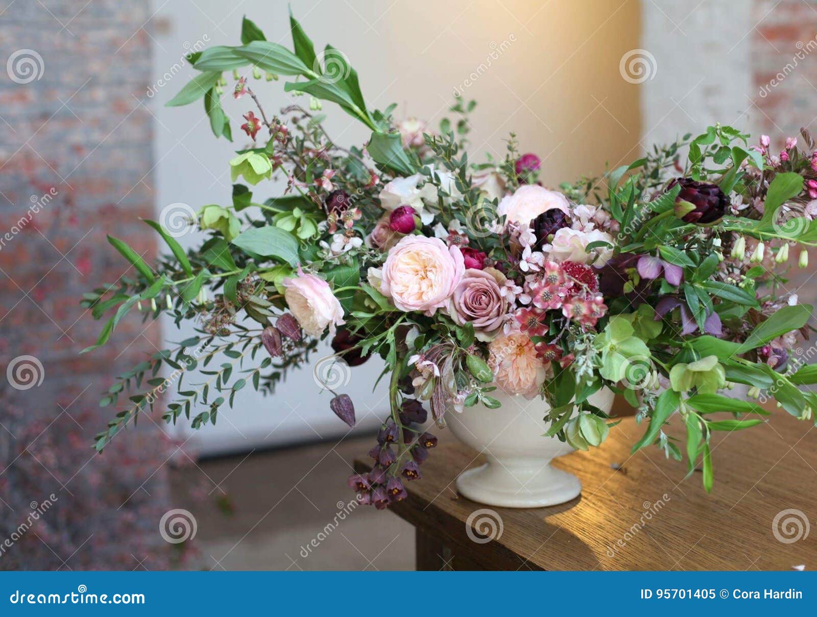 large floral arrangement in urn