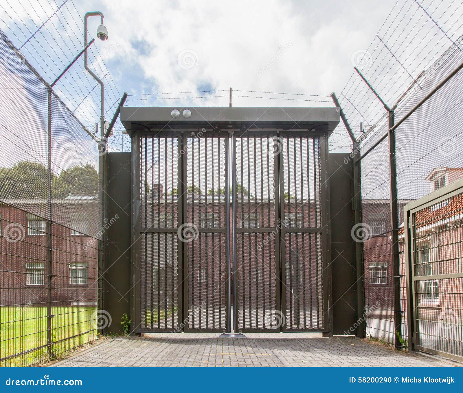 Large gate at an old jail stock photo. Image of building 58200290