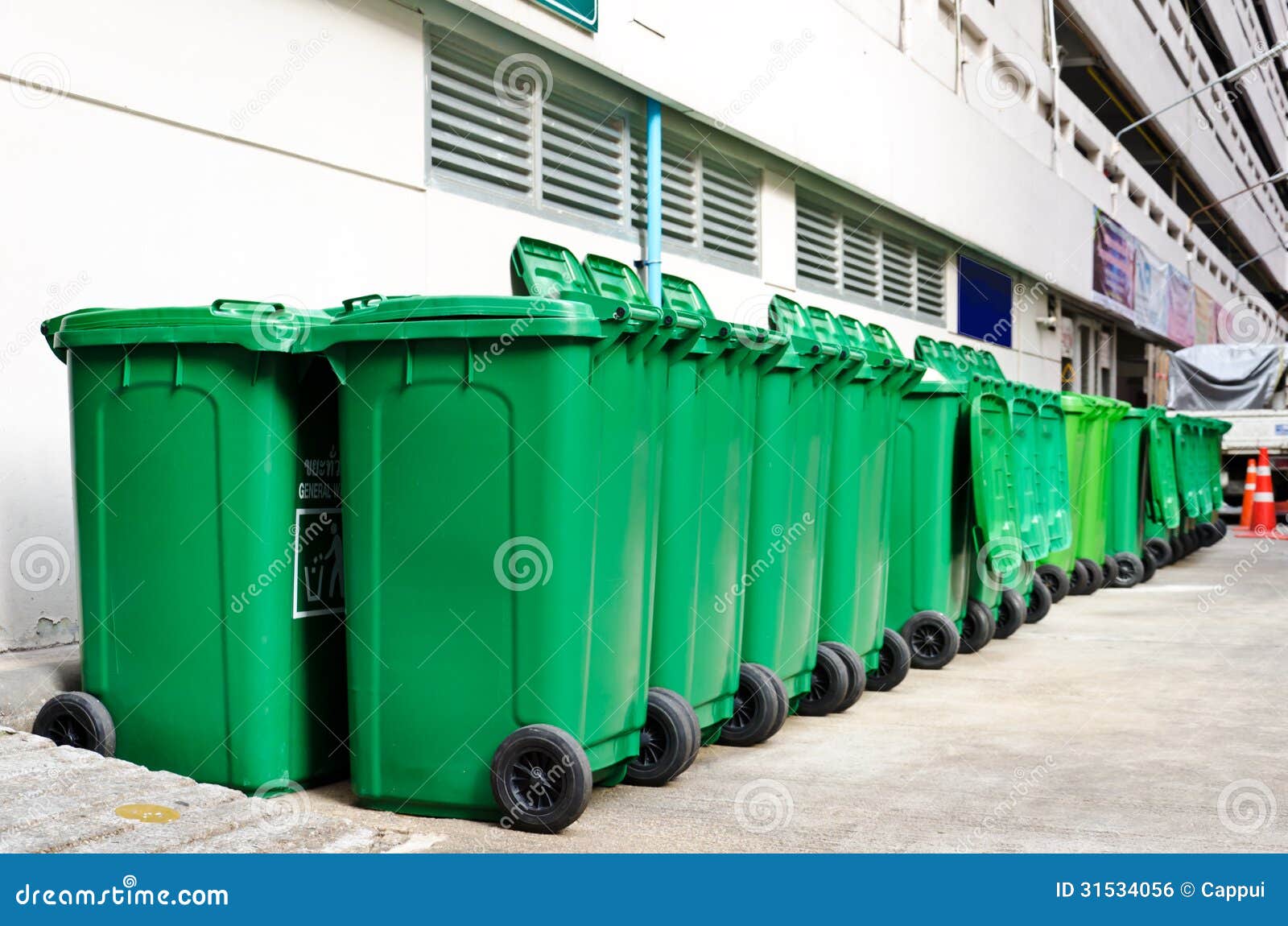 Large green trash cans stock photo. Image of symbol, road 31534056