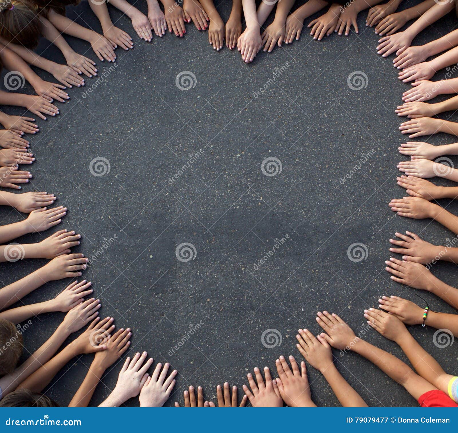 large group of children's hand forming a heart 
