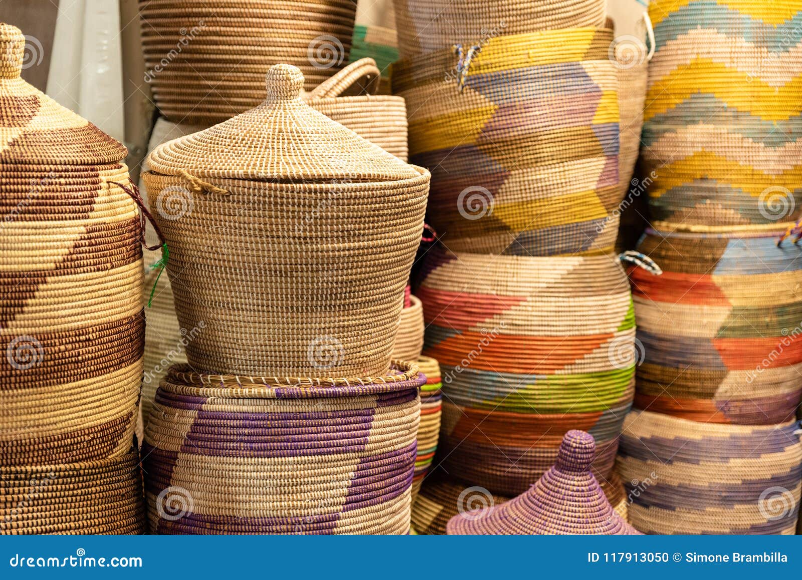 Large Handmade Colored Baskets in an African Market Stock Photo