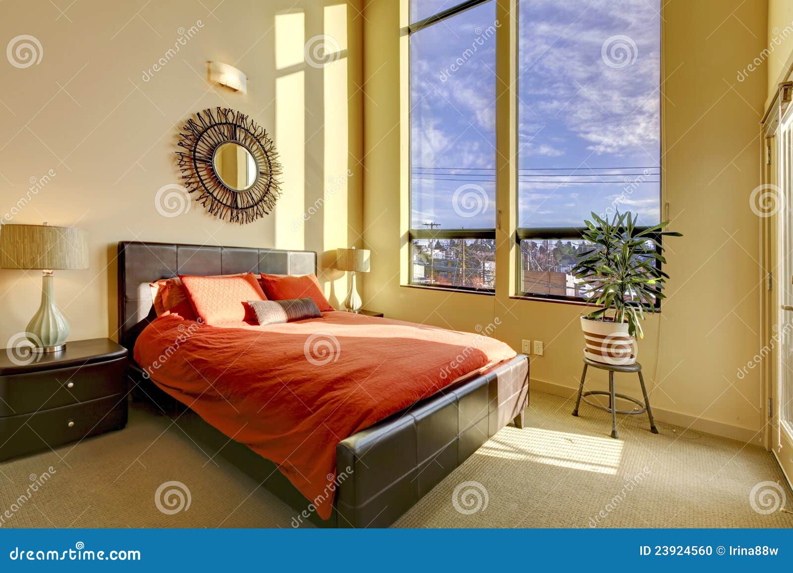 Large High Ceiling Bedroom with Red Bed. Stock Photo Image of ceiling
