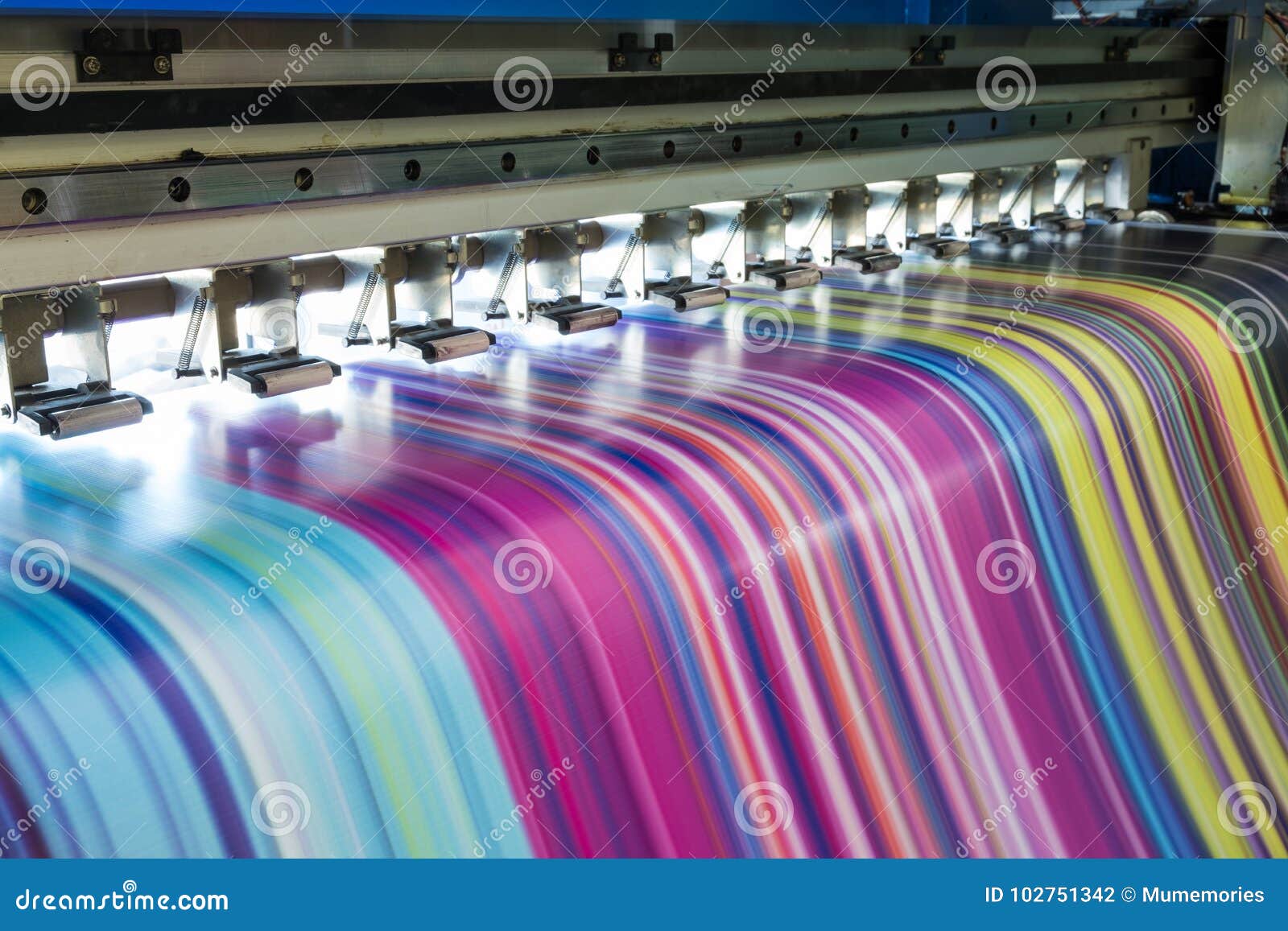 Large Inkjet Printer Working Multicolor on Vinyl Banner Stock Photo