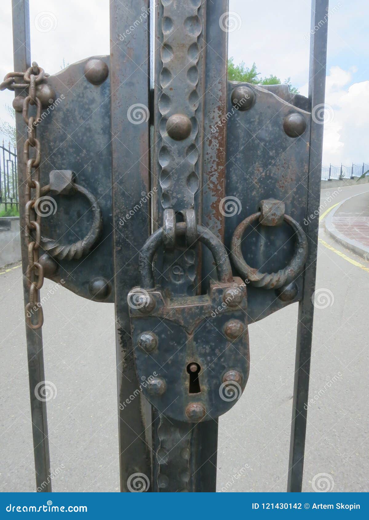Large Iron Lock with Chains at the Entrance Gate Stock Photo - Image of ...