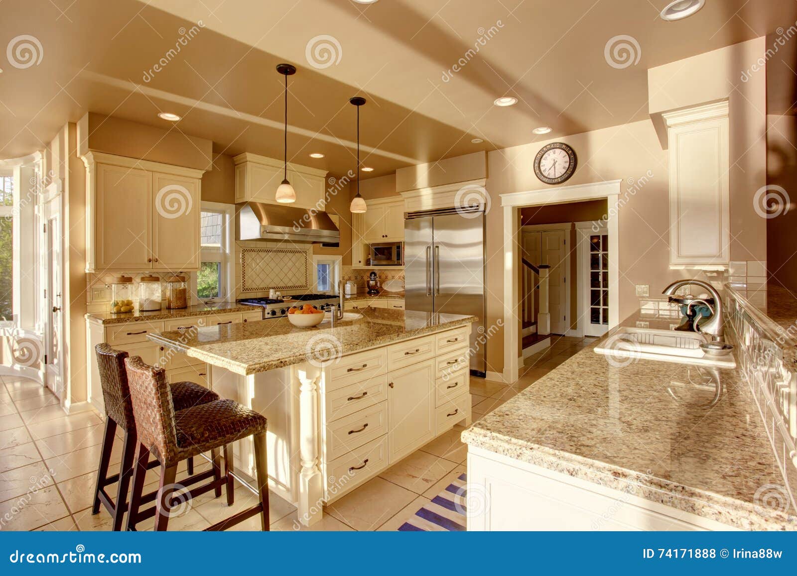 Large Luxury Kitchen Room In Beige Colors With Granite Counter