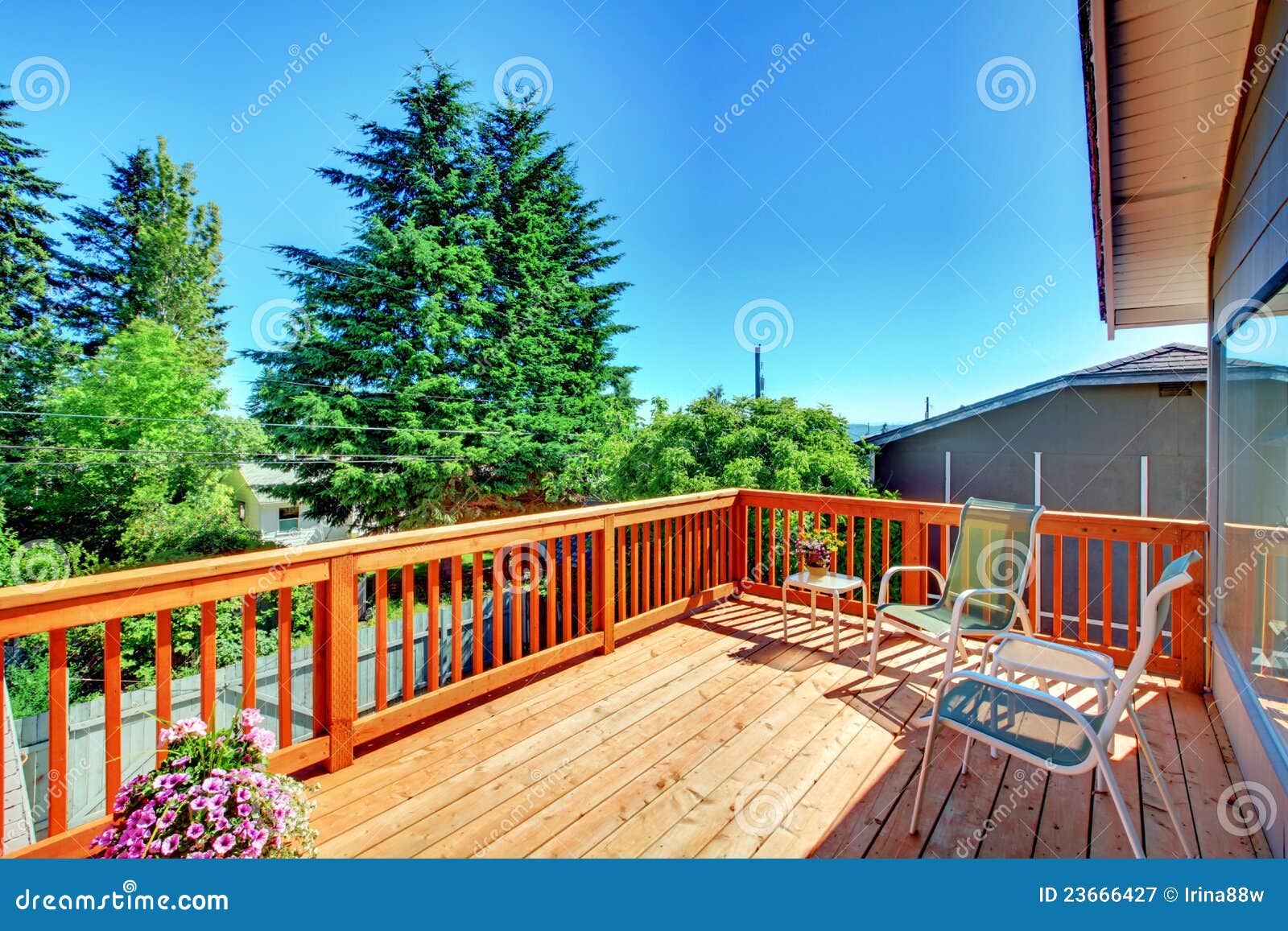 Large New Wood Deck Home Exterior with Chairs. Stock Image Image of