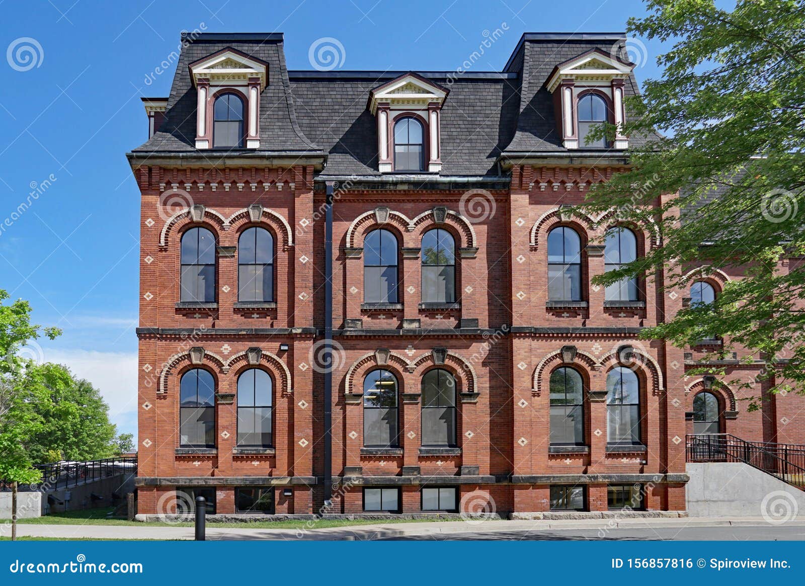 Large Old Fashioned Brick Building Stock Photo - Image of windows