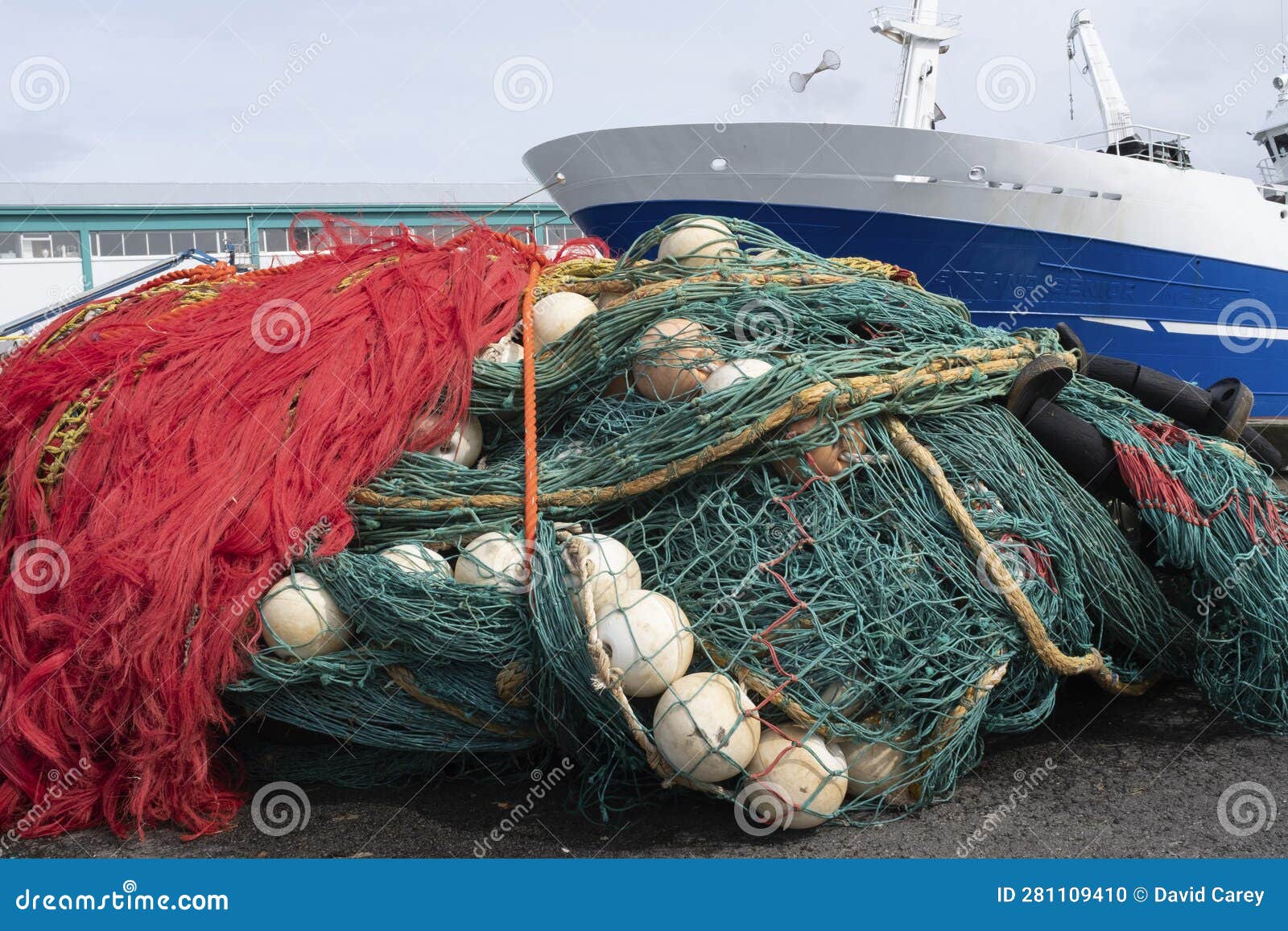 https://thumbs.dreamstime.com/z/large-orange-green-fishing-nets-floats-piled-dock-large-fishing-nets-floats-piled-dock-hull-281109410.jpg