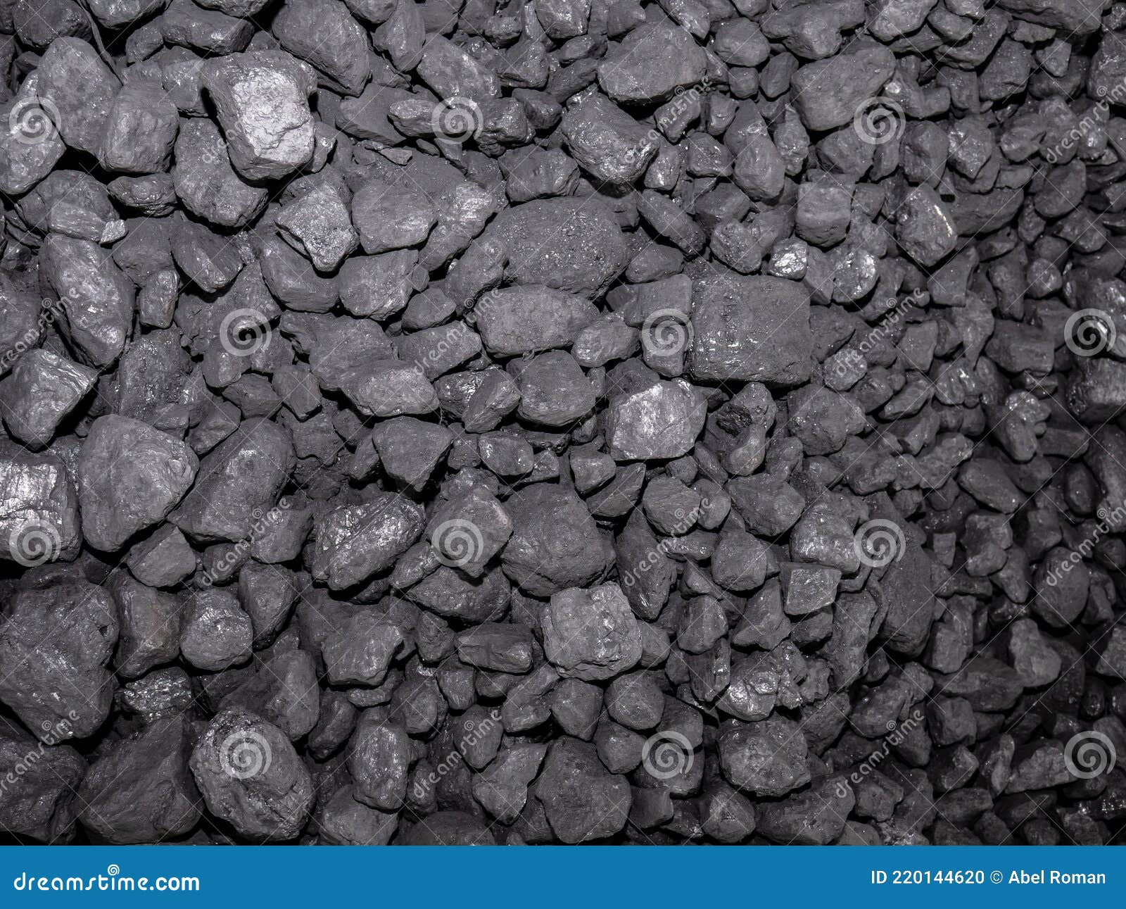 a large pile of carbon stones piled up for subsequent combustion, forming an energetic background of this precious mineral