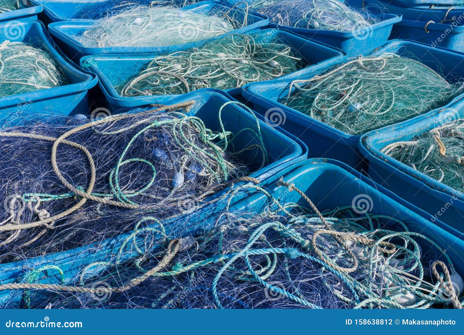 Large Plastic Tubs Filled with Industrial Size Fishing and