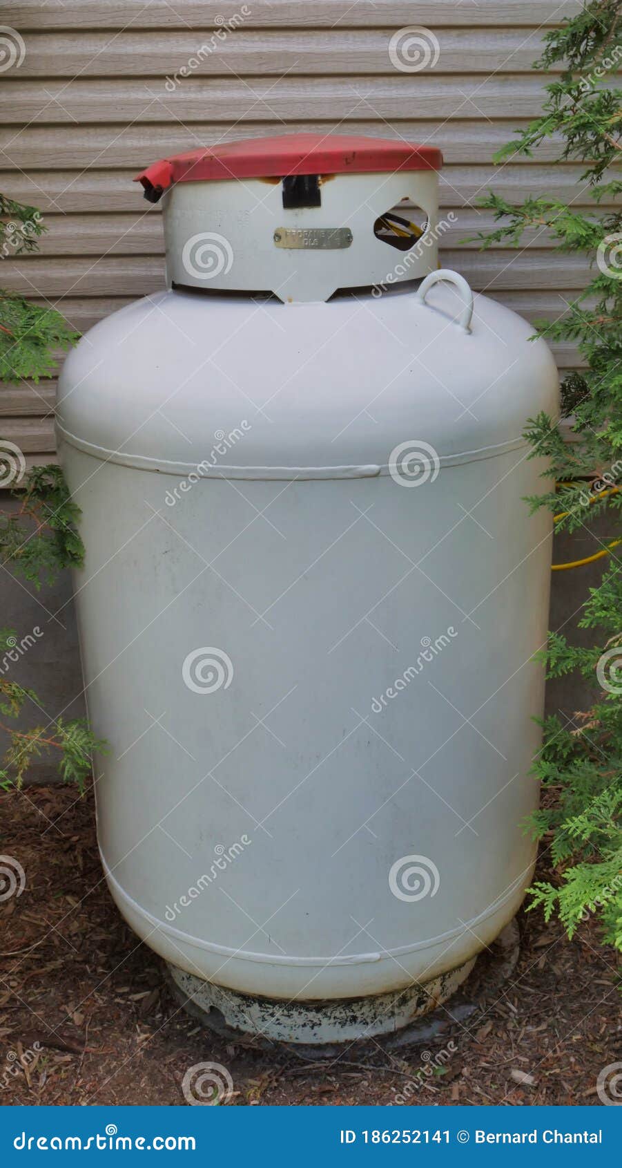 Large 400 Pound Propane Tank in the Yard of a Rural Home Stock