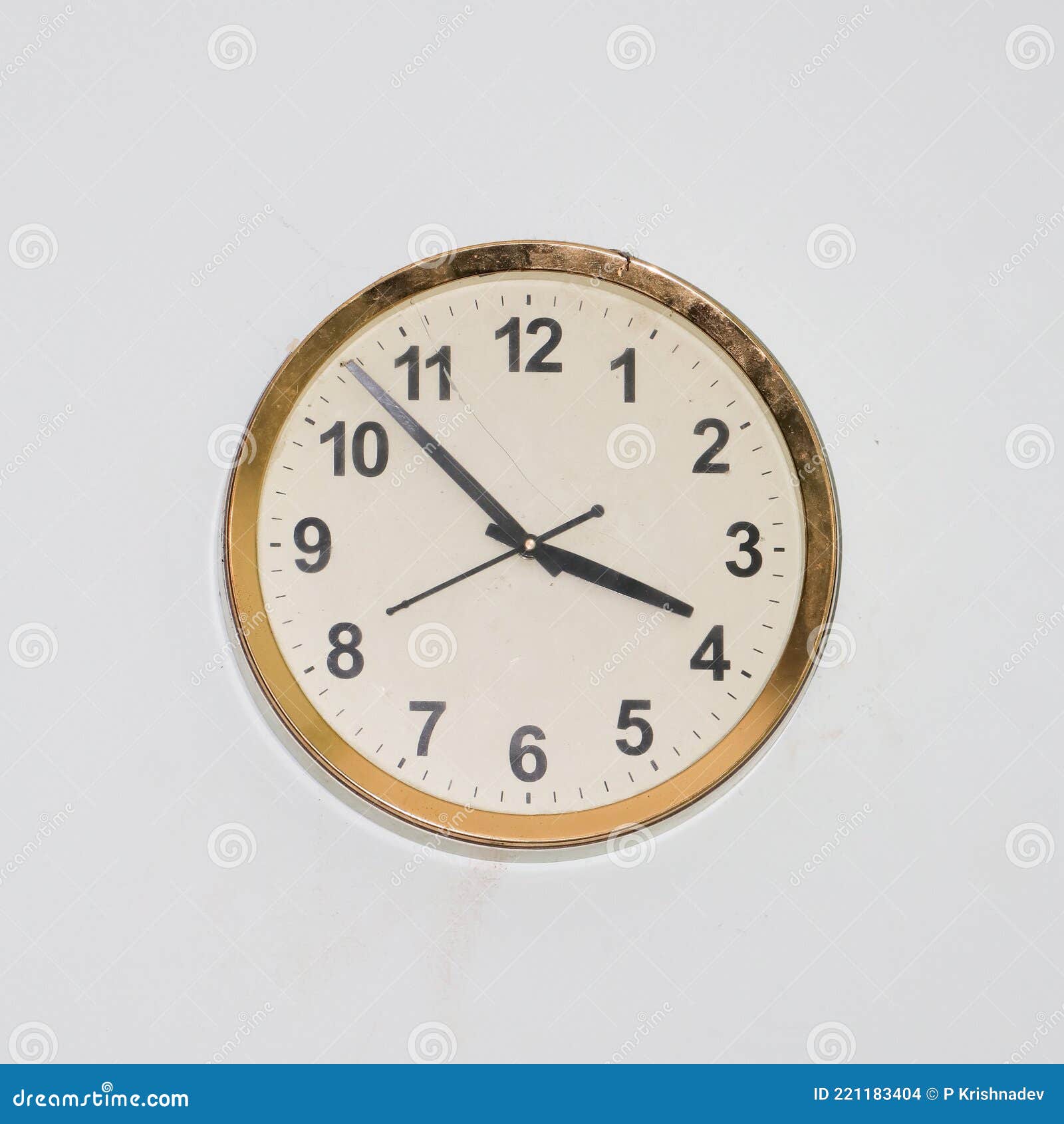 Large Round Clock with an Old, Simple Design and a Gold Frame Stock