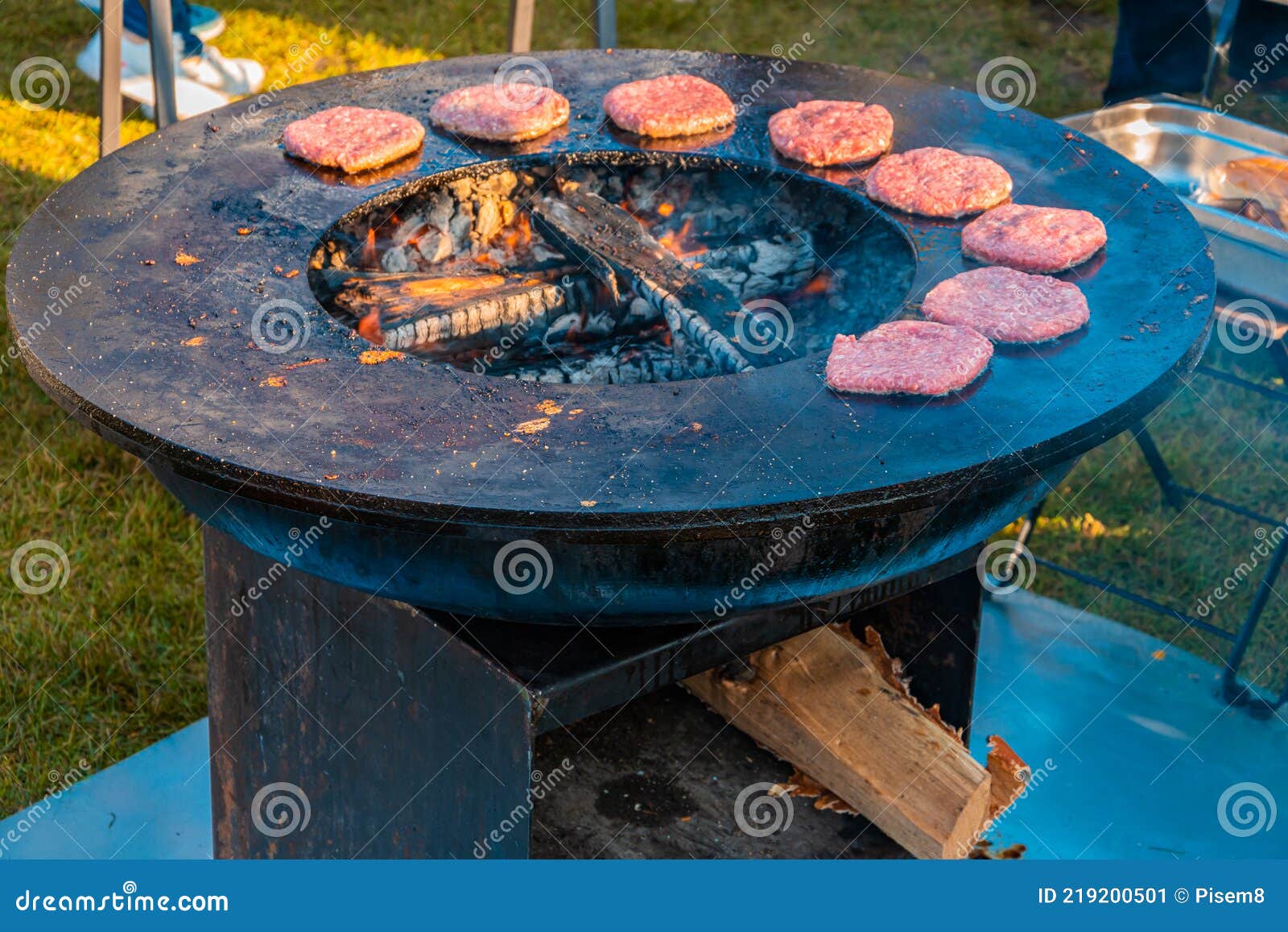 A Large Round Wood-burning Grill Image Image of 219200501