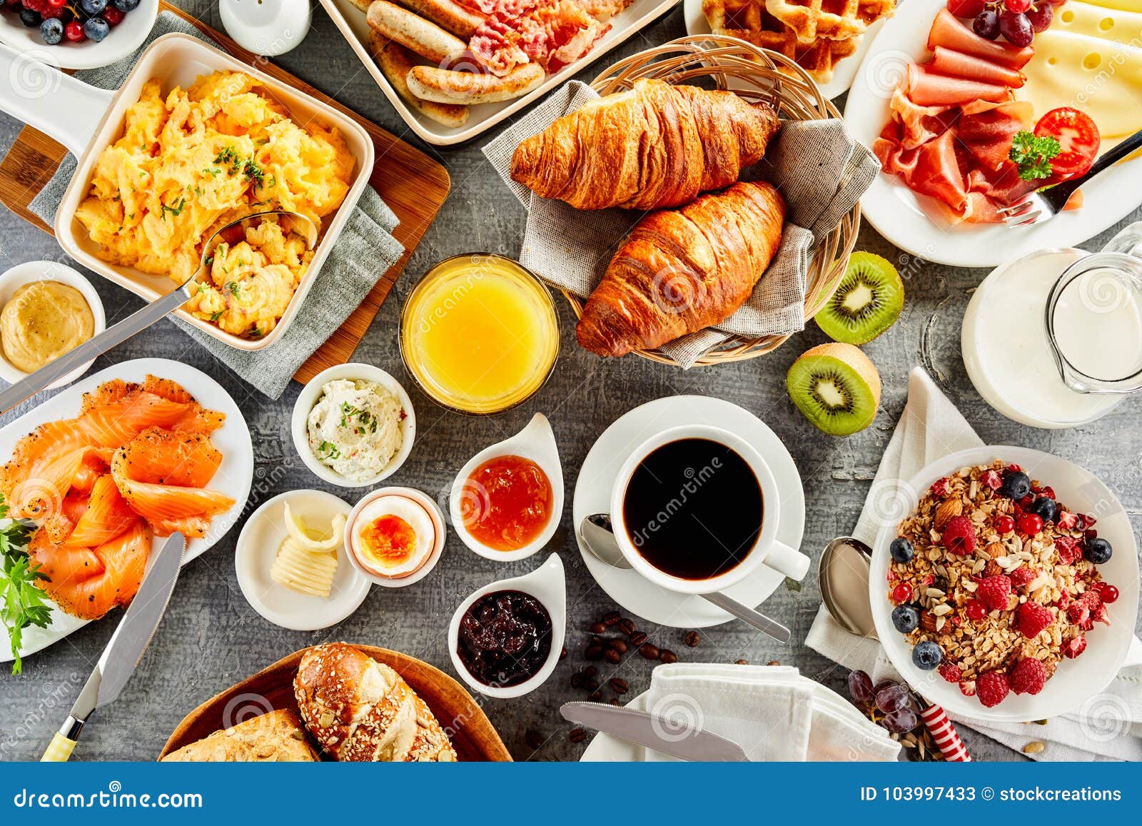 large selection of breakfast food on a table