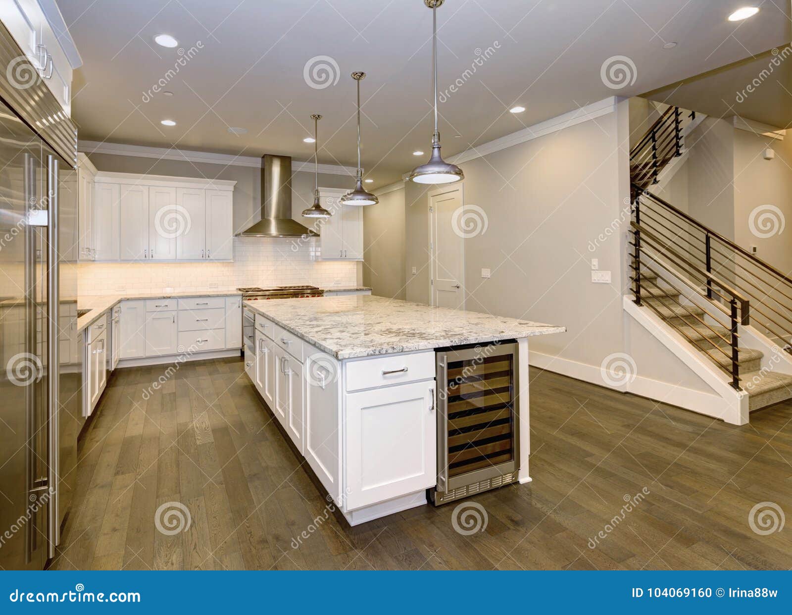 Large, Spacious Kitchen Design with White Kitchen Stock Photo