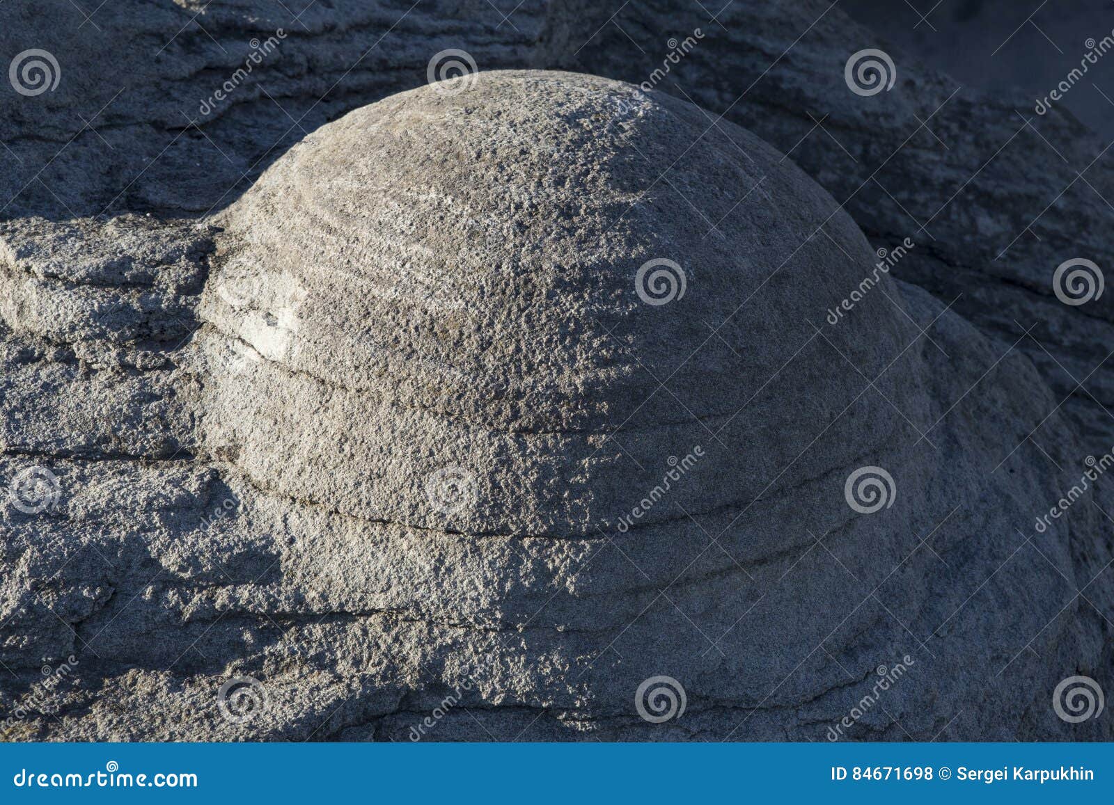 large spherical nodule of sandstone.