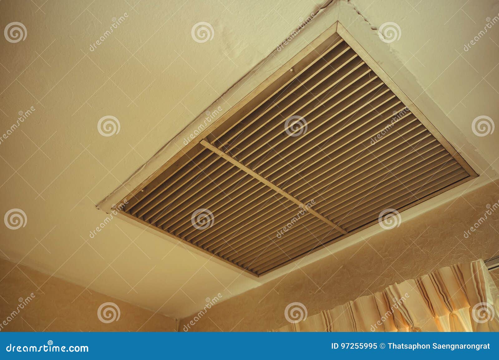 Large Square Return Air Vent Located in the Ceiling of a Home. Stock