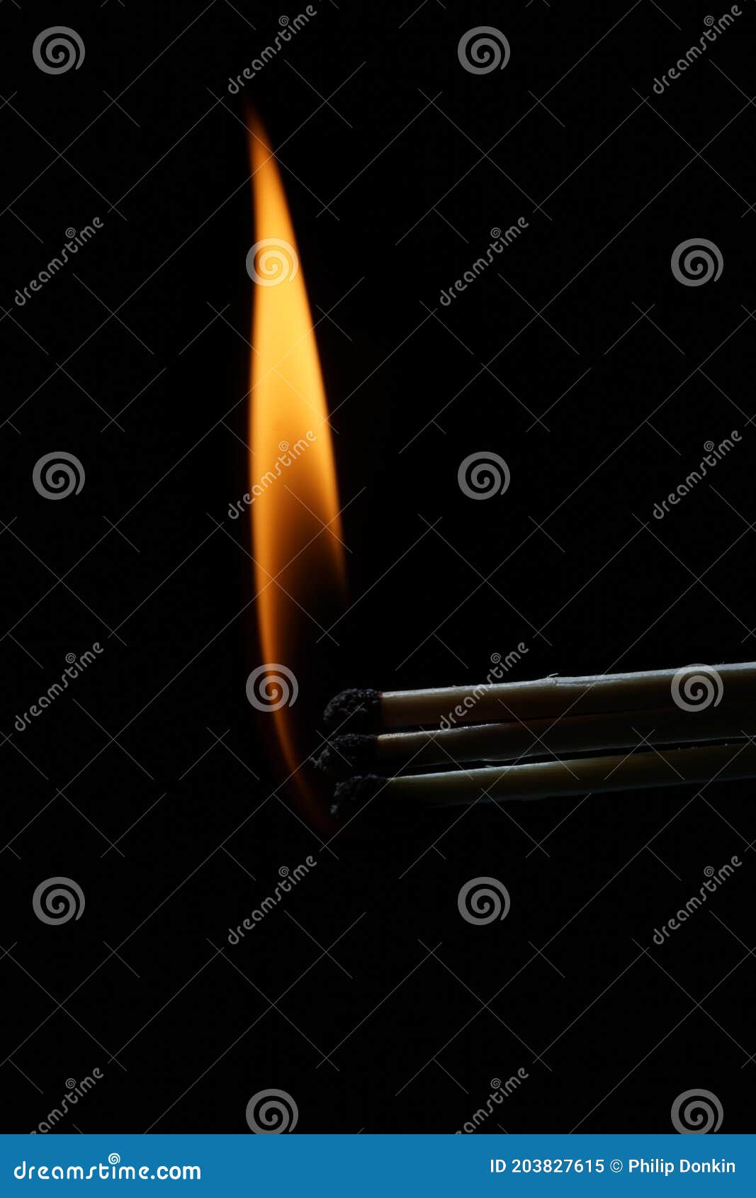 Large Striking Matches Lighter with Its Flame Showing Stock Image