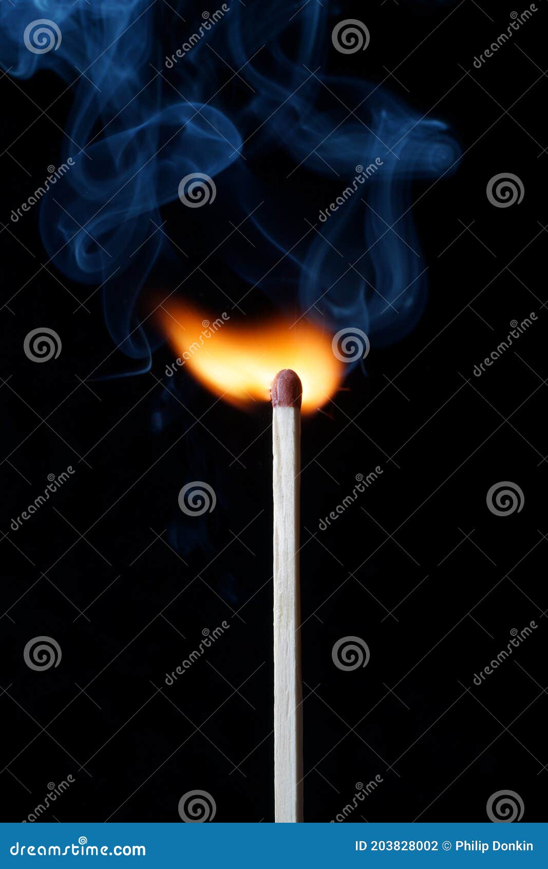 Large Striking Matches Lighter with Its Flame Showing Stock Photo