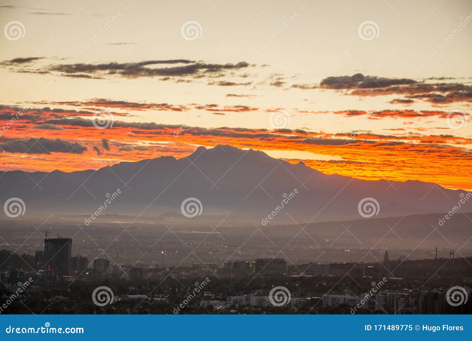 the mountains of the city watching from above