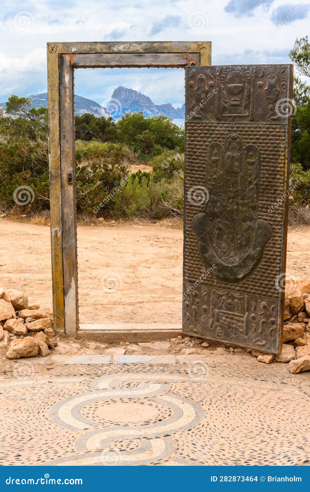 las puertas de can soleil doors in ibiza with es vedra island in the background