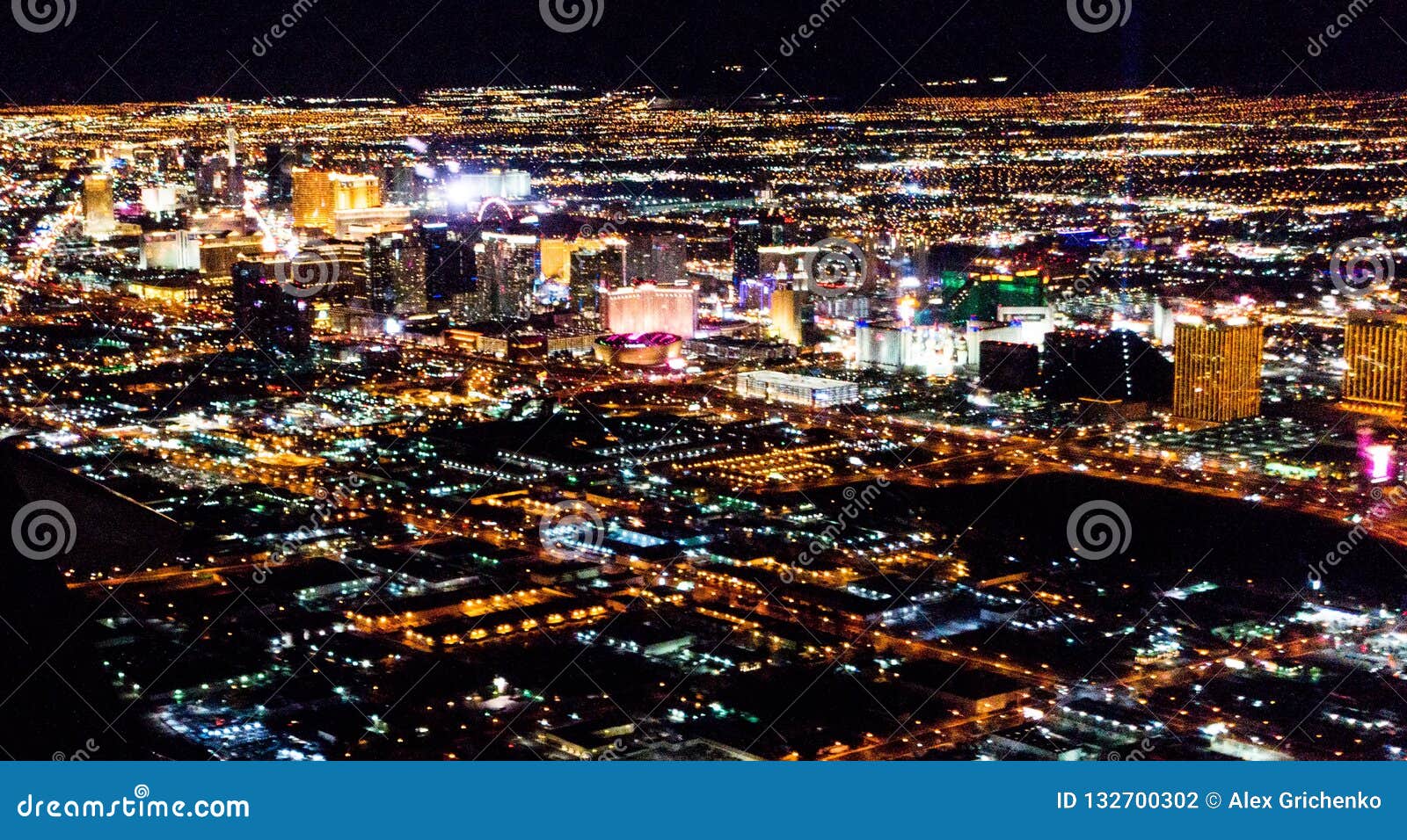 Las Vegas City lights from airplane at night by Alex Grichenko