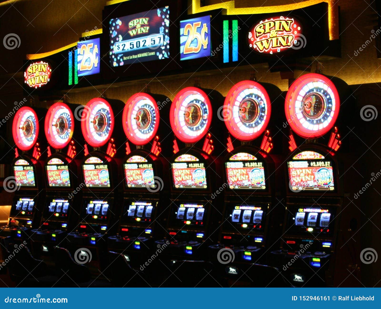 Las Vegas, NV, USA - 13th July 2013: People Playing Slot Machine Games  Inside Las Vegas Casino. Stock Photo, Picture and Royalty Free Image. Image  26254649.