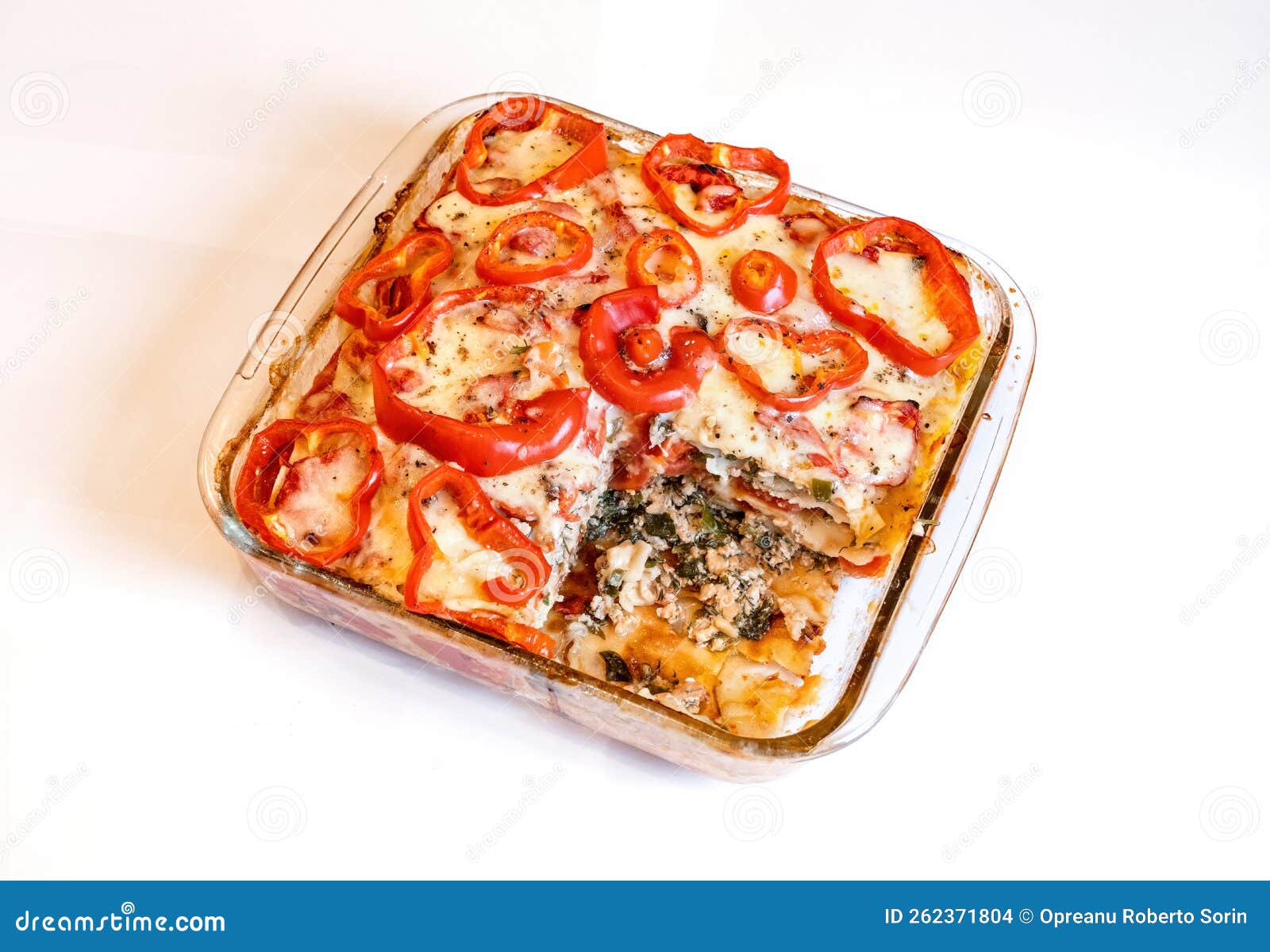 Lasagna in a glass bowl stock photo. Image of baked 262371804