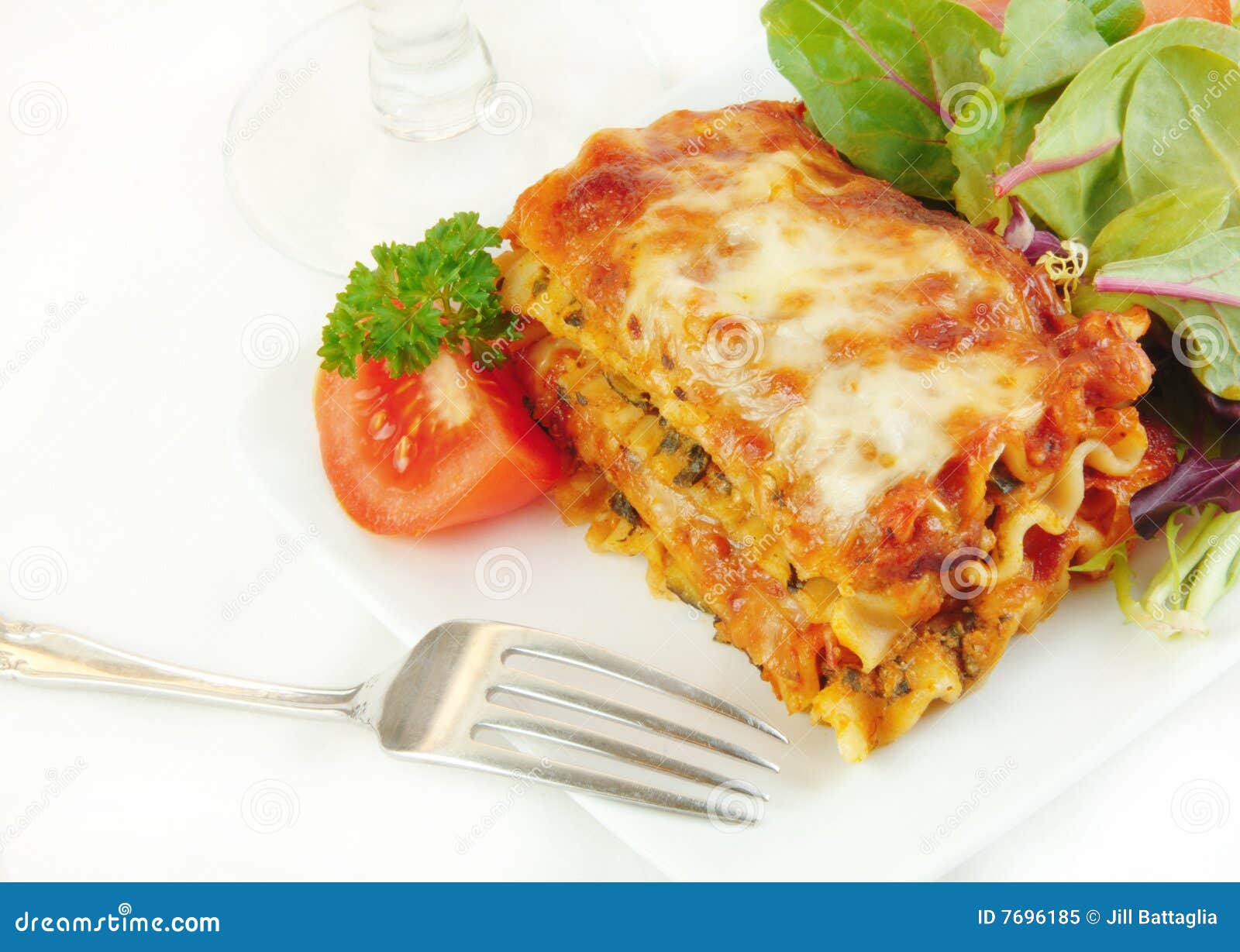 Lasagna on a Plate with Salad Stock Image Image of salad, serving