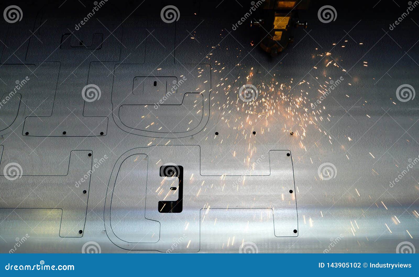 Laser Cutting of Metal Sheets in a Metal Construction Company Stock